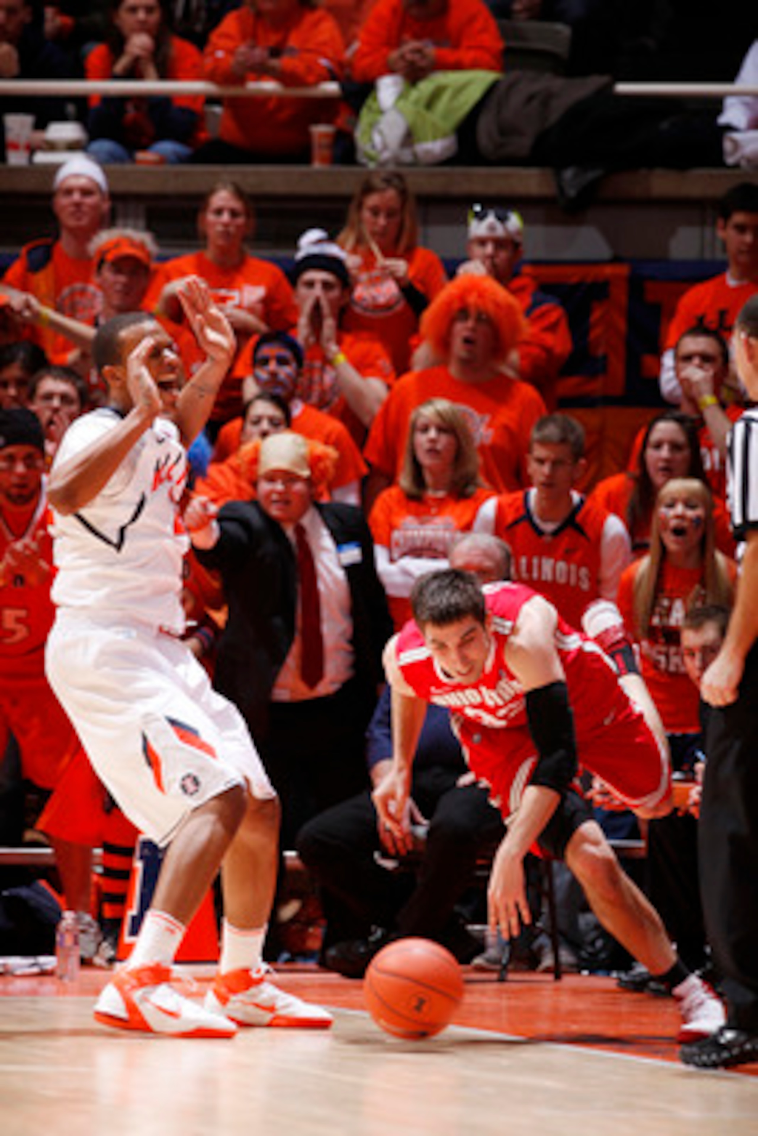 CHAMPAIGN, IL - JANUARY 22: Jereme Richmond #22 of the Illinois Fighting Illini reacts after being called for a foul while defending against Jon Diebler #33 of the Ohio State Buckeyes at Assembly Hall on January 22, 2011 in Champaign, Illinois. Ohio State