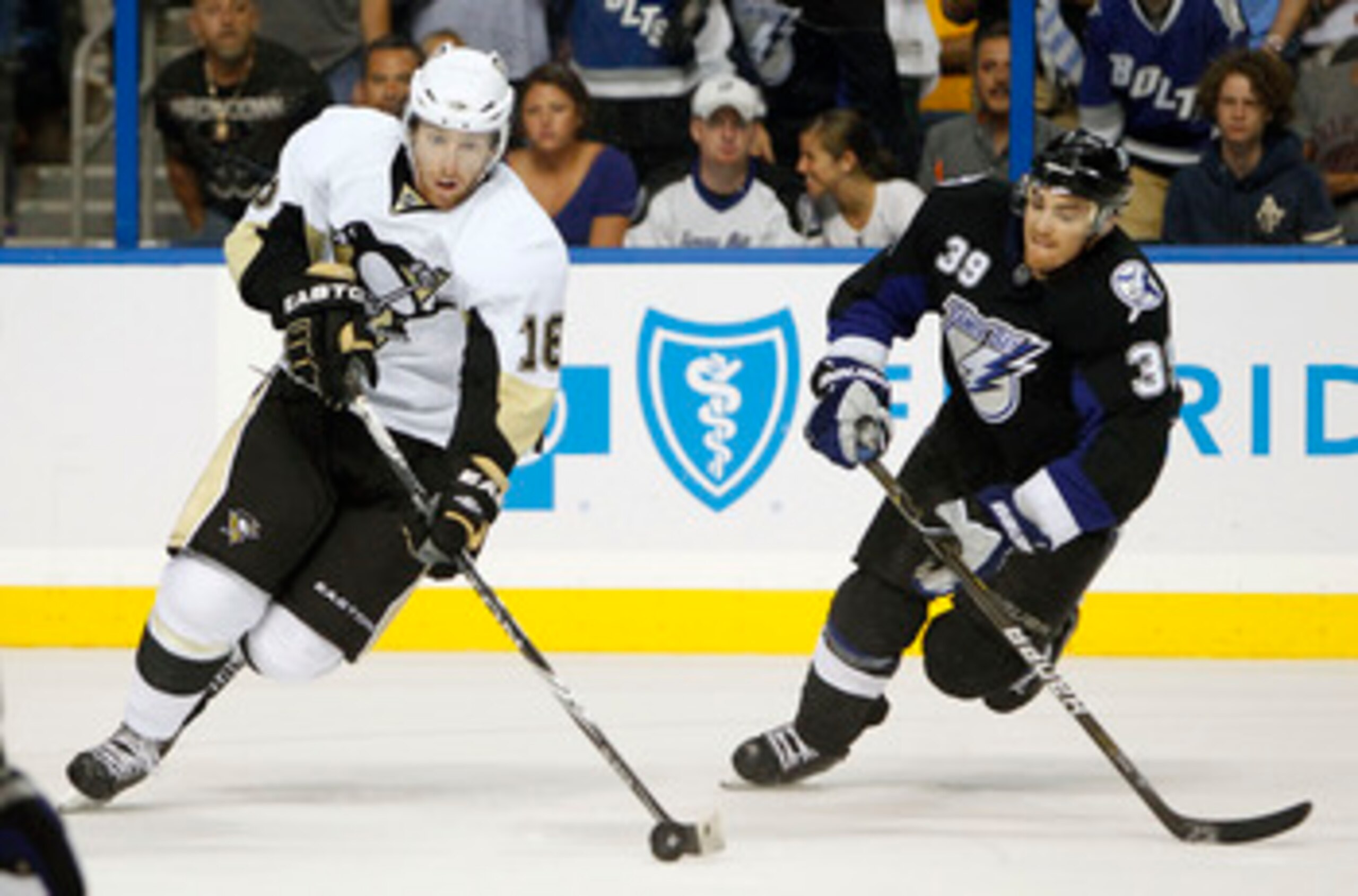 TAMPA, FL - APRIL 20: James Neal #18 of the Pittsburgh Penguins skates with the puck against Mike Lundin #39 of the Tampa Bay Lightning in Game Four of the Eastern Conference Quarterfinals during the 2011 NHL Stanley Cup Playoffs at the St. Pete Times For