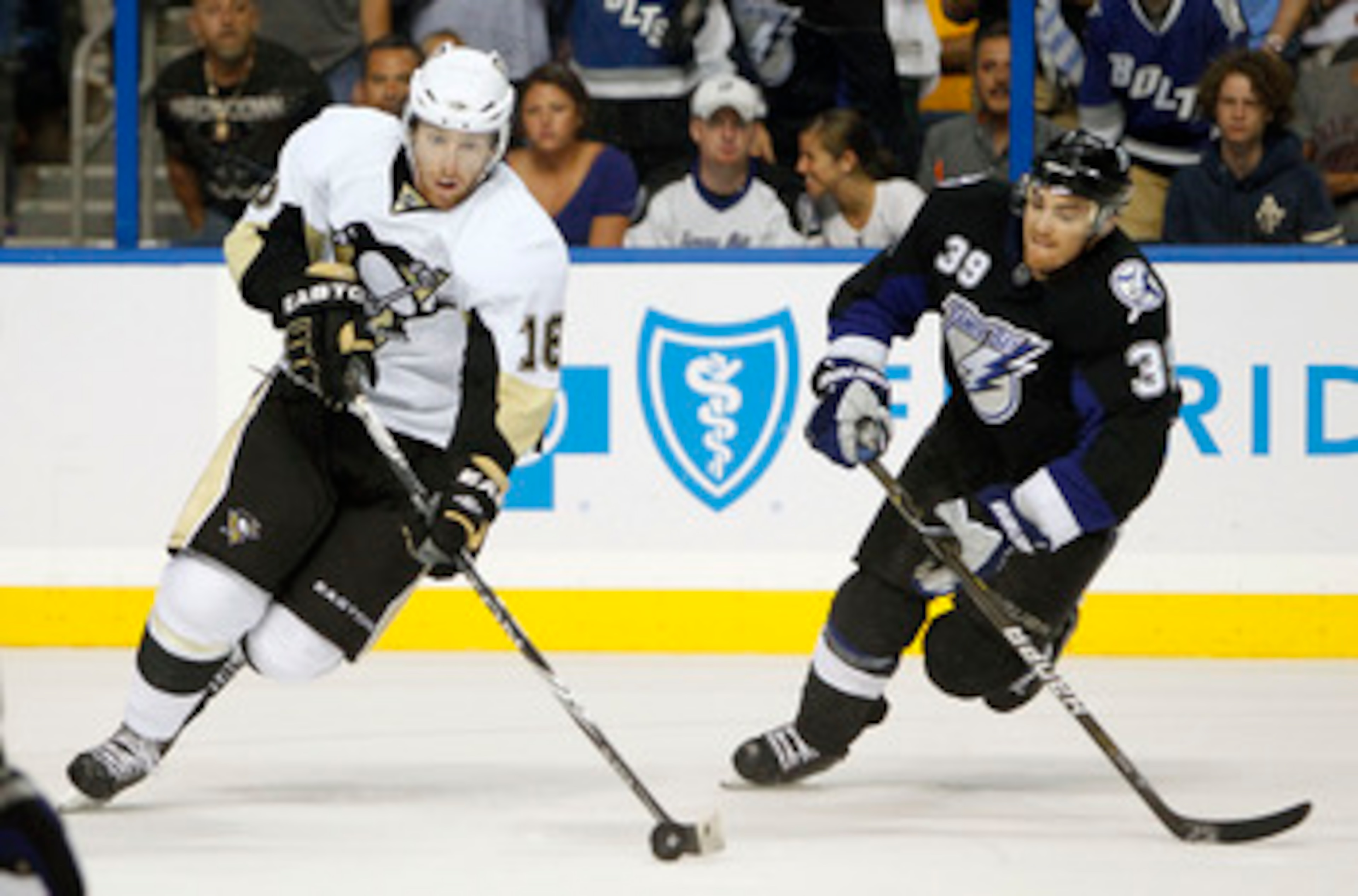 TAMPA, FL - APRIL 20: James Neal #18 of the Pittsburgh Penguins skates with the puck against Mike Lundin #39 of the Tampa Bay Lightning in Game Four of the Eastern Conference Quarterfinals during the 2011 NHL Stanley Cup Playoffs at the St. Pete Times For