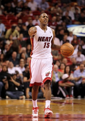 MIAMI, FL - FEBRUARY 08: Mario Chalmers #15 of the Miami Heat calls a play during a game against the Indiana Pacers at American Airlines Arena on February 8, 2011 in Miami, Florida. NOTE TO USER: User expressly acknowledges and agrees that, by downloading