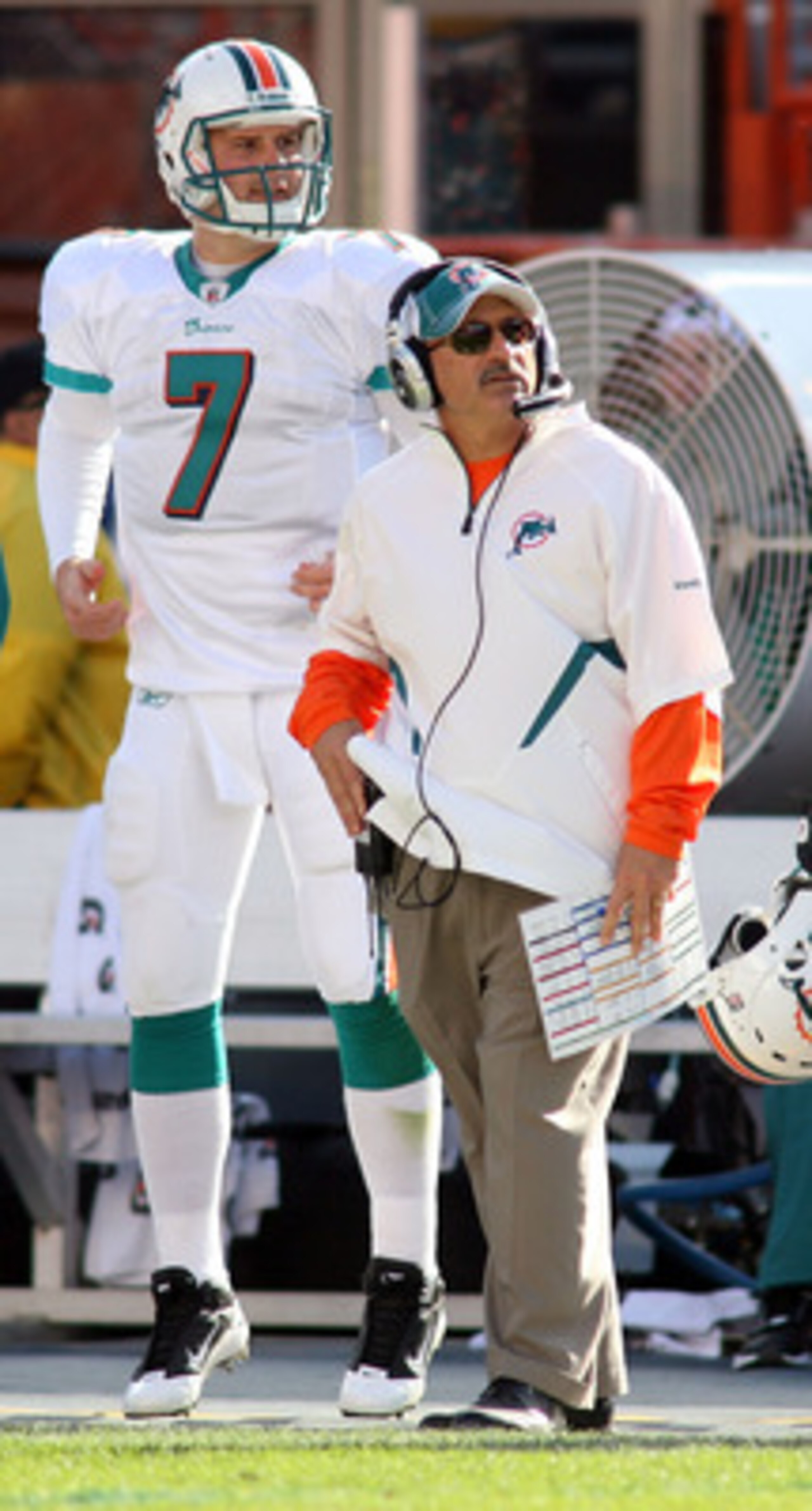 MIAMI - DECEMBER 26: (L-R) Quarterback Chad Henne #7, coach Tony Sparano and running back Ricky Williams #34 of the Miami Dolphins look on from the sidelines against the Detroit Lions at Sun Life Stadium on December 26, 2010 in Miami, Florida.  (Photo by 