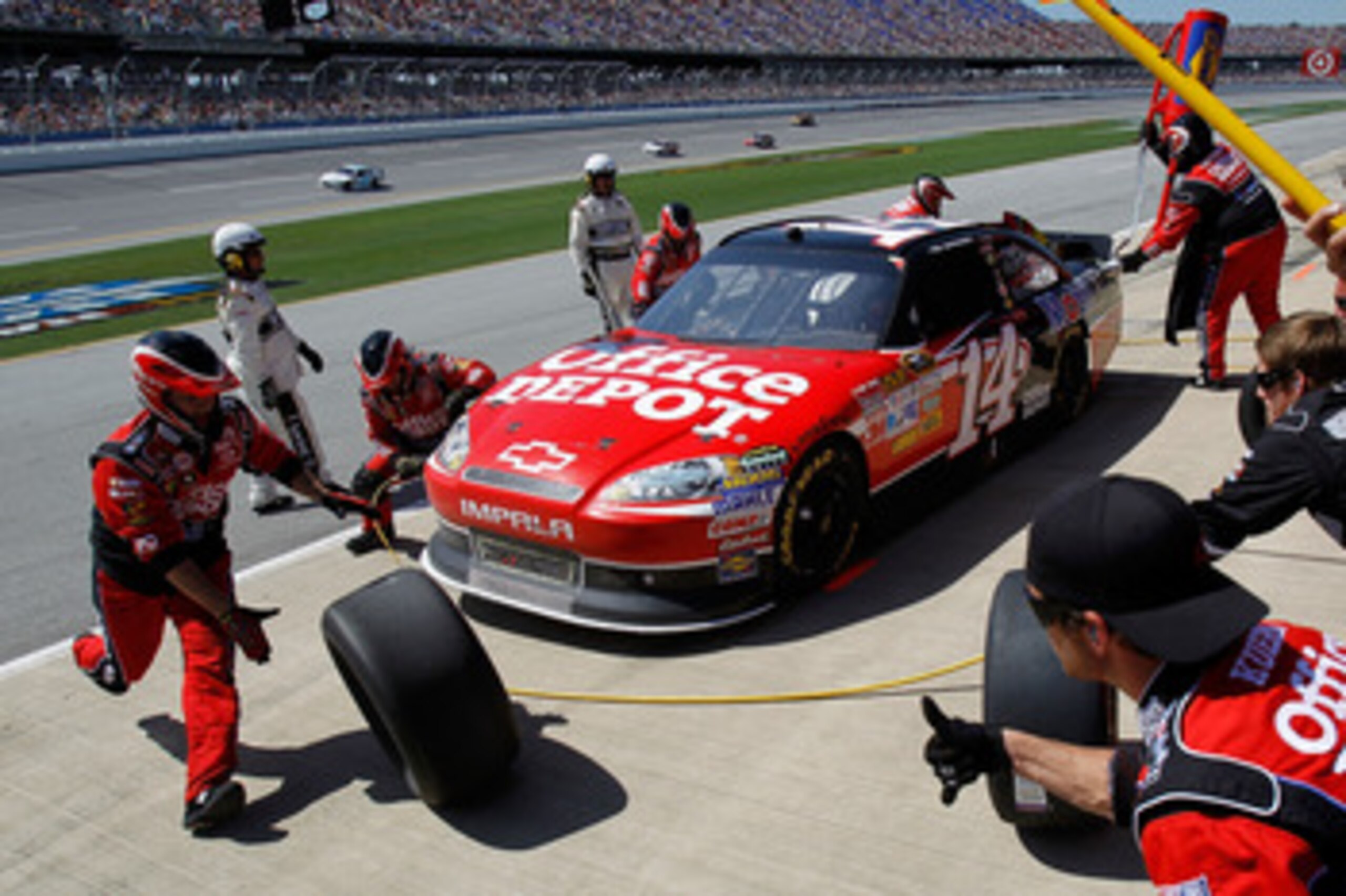 TALLADEGA, AL - APRIL 17:  Tony Stewart, driver of the #14 Office Depot/Mobil 1 Chevrolet, pits during the NASCAR Sprint Cup Series Aaron's 499 at Talladega Superspeedway on April 17, 2011 in Talladega, Alabama.  (Photo by Todd Warshaw/Getty Images for NA