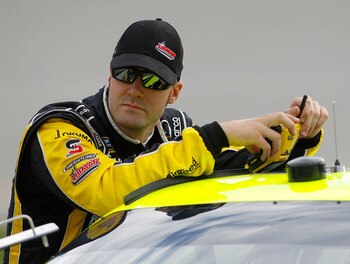 RICHMOND, VA - APRIL 29:  Paul Menard, driver of the #27 Libman/Menards Chevrolet, looks on during qualifying for the NASCAR Sprint Cup Series Crown Royal Presents The Matthew & Daniel Hansen 400 at Richmond International Raceway on April 29, 2011 in Rich