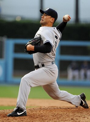 LOS ANGELES - JUNE 26:  Chan Ho Park #61 of the New York Yankees pitches against the Los Angeles Dodgers on June 26, 2010 at Dodger Stadium in Los Angeles, California.  (Photo by Lisa Blumenfeld/Getty Images)