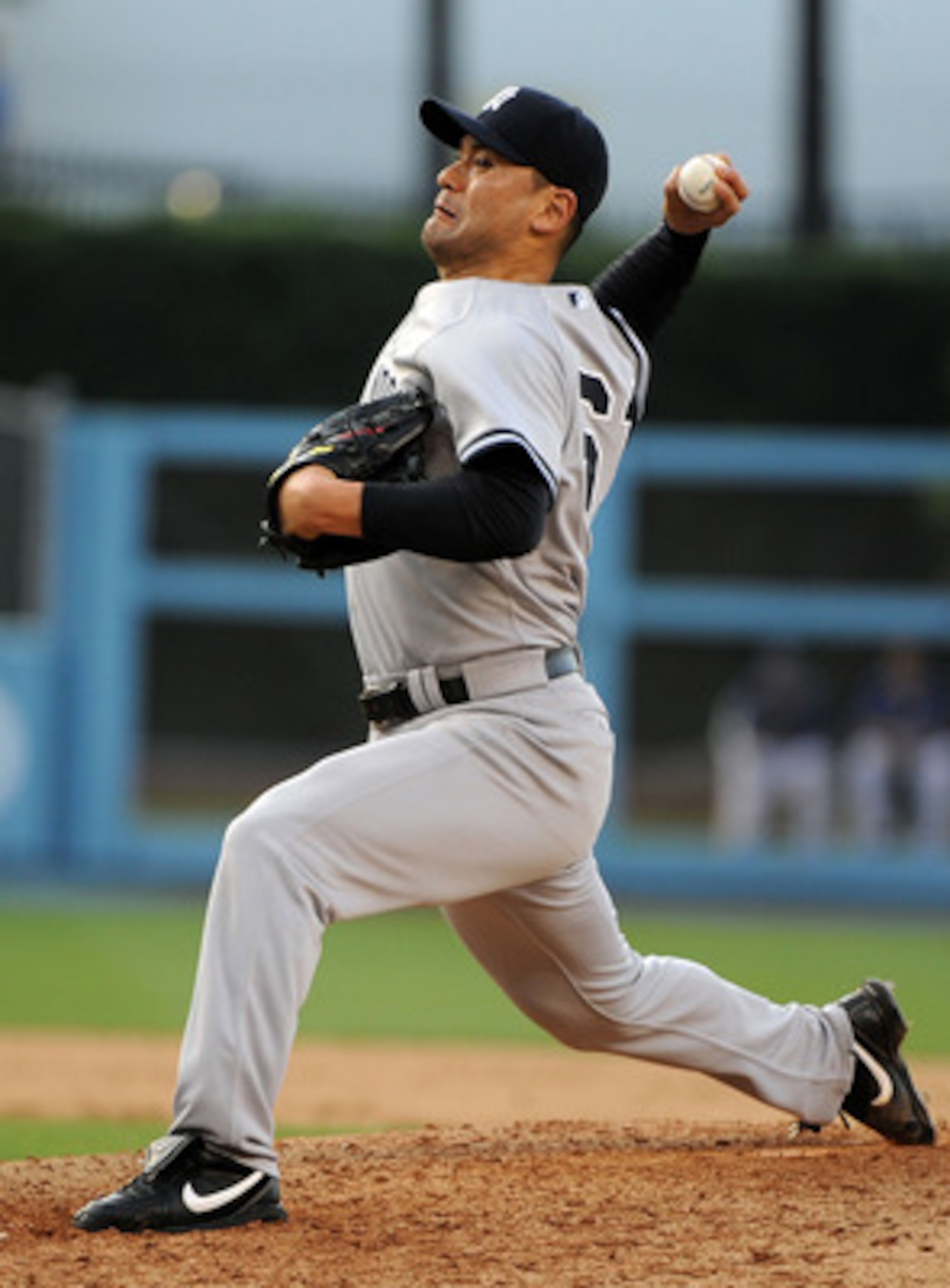 LOS ANGELES - JUNE 26:  Chan Ho Park #61 of the New York Yankees pitches against the Los Angeles Dodgers on June 26, 2010 at Dodger Stadium in Los Angeles, California.  (Photo by Lisa Blumenfeld/Getty Images)