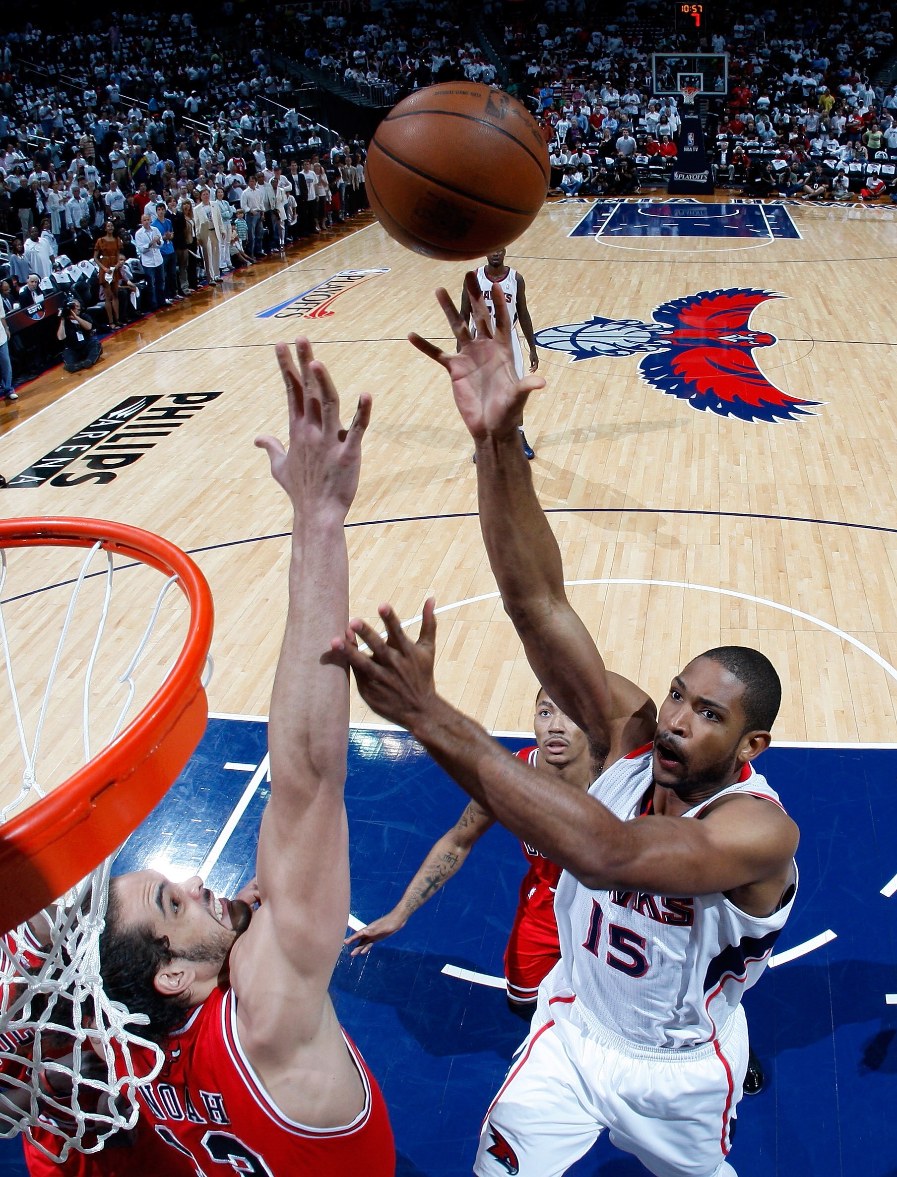 ATLANTA, GA - MAY 06:  Al Horford #15 of the Atlanta Hawks shoots over Joakim Noah #13 of the Chicago Bulls in Game Three of the Eastern Conference Semifinals in the 2011 NBA Playoffs at Phillips Arena on May 6, 2011 in Atlanta, Georgia.  NOTE TO USER: Us