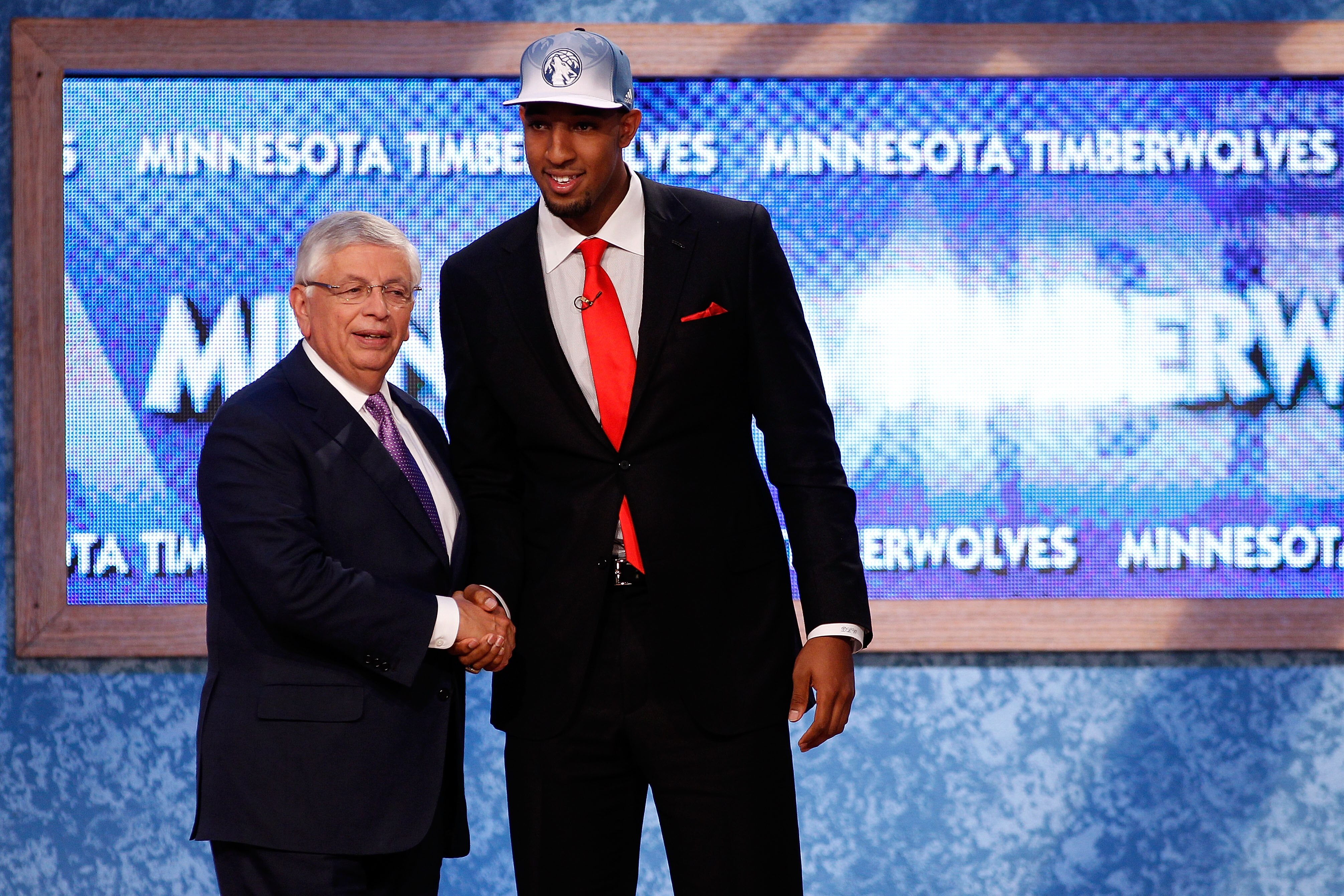 NEWARK, NJ - JUNE 23:  Derrick Williams (R) from Arizona greets NBA Commissioner David Stern after he was selected #2 overall by the Minnesota Timberwolves in the first round during the 2011 NBA Draft at the Prudential Center on June 23, 2011 in Newark, N
