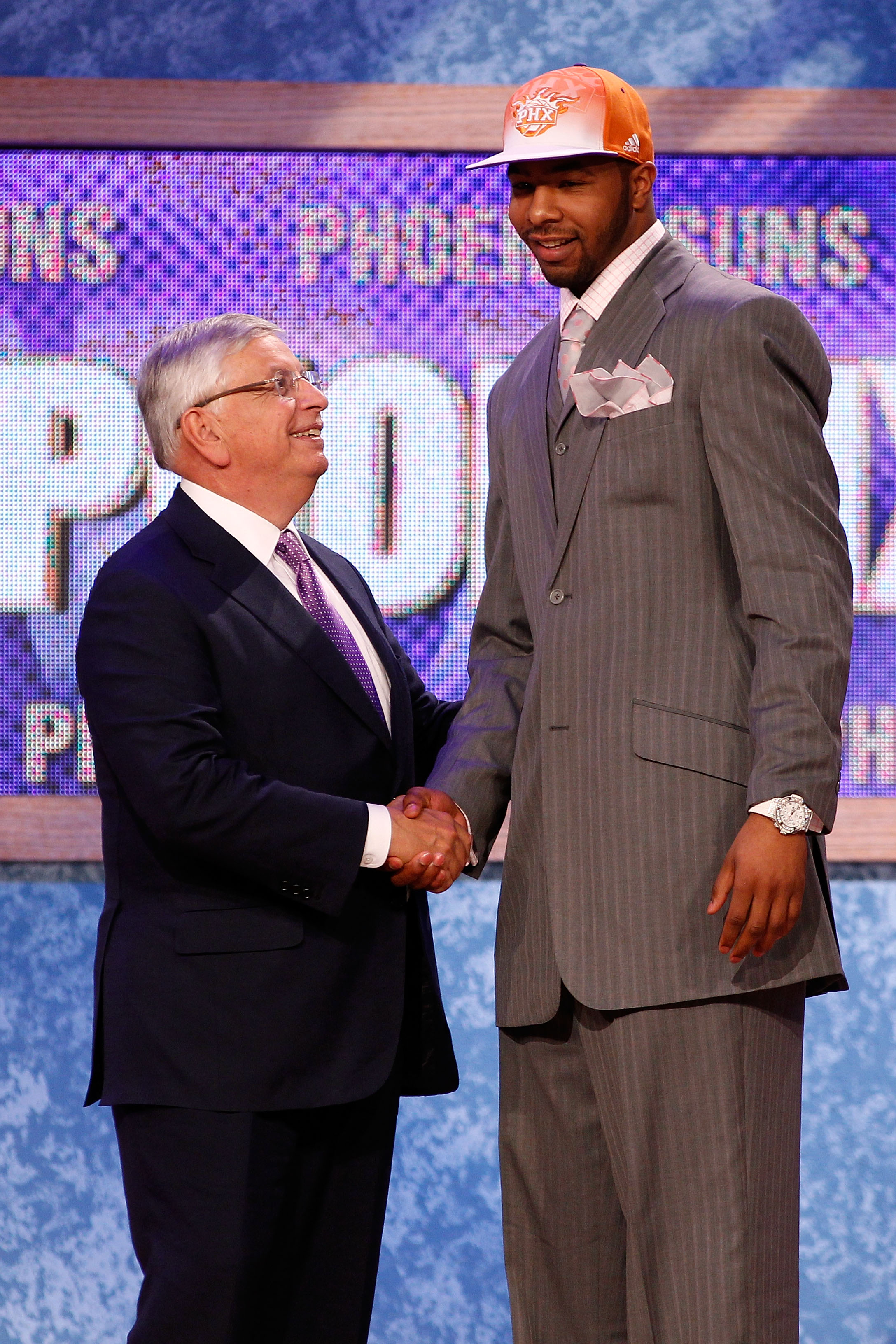 NEWARK, NJ - JUNE 23:  Markieff Morris from the Kansas Jayhawks greets NBA Commissioner David Stern after he was drafted #13 overall by the Phoenix Suns in the first round during the 2011 NBA Draft at the Prudential Center on June 23, 2011 in Newark, New