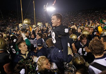 SOUTH BEND, IN - NOVEMBER 13: Ryan Sheehan #39 of the Notre Dame Fighting Irish is lifted by students while celebrating a win over the Utah Utes at Notre Dame Stadium on November 13, 2010 in South Bend, Indiana. Notre Dame defeated Utah 28-3. (Photo by Jo