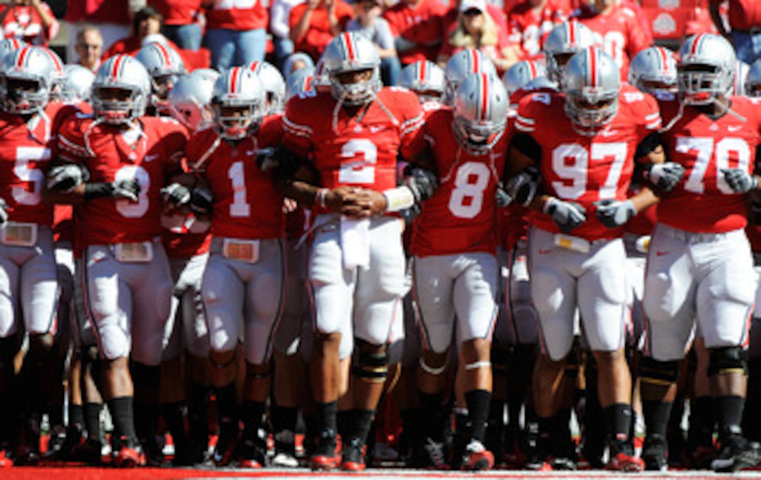 COLUMBUS, OH - SEPTEMBER 25:  Led by quarterback Terrelle Pryor #2, the Ohio State Buckeyes take the field for pregame warm ups before playing the Eastern Michigan Eagles at Ohio Stadium on September 25, 2010 in Columbus, Ohio.  (Photo by Jamie Sabau/Gett