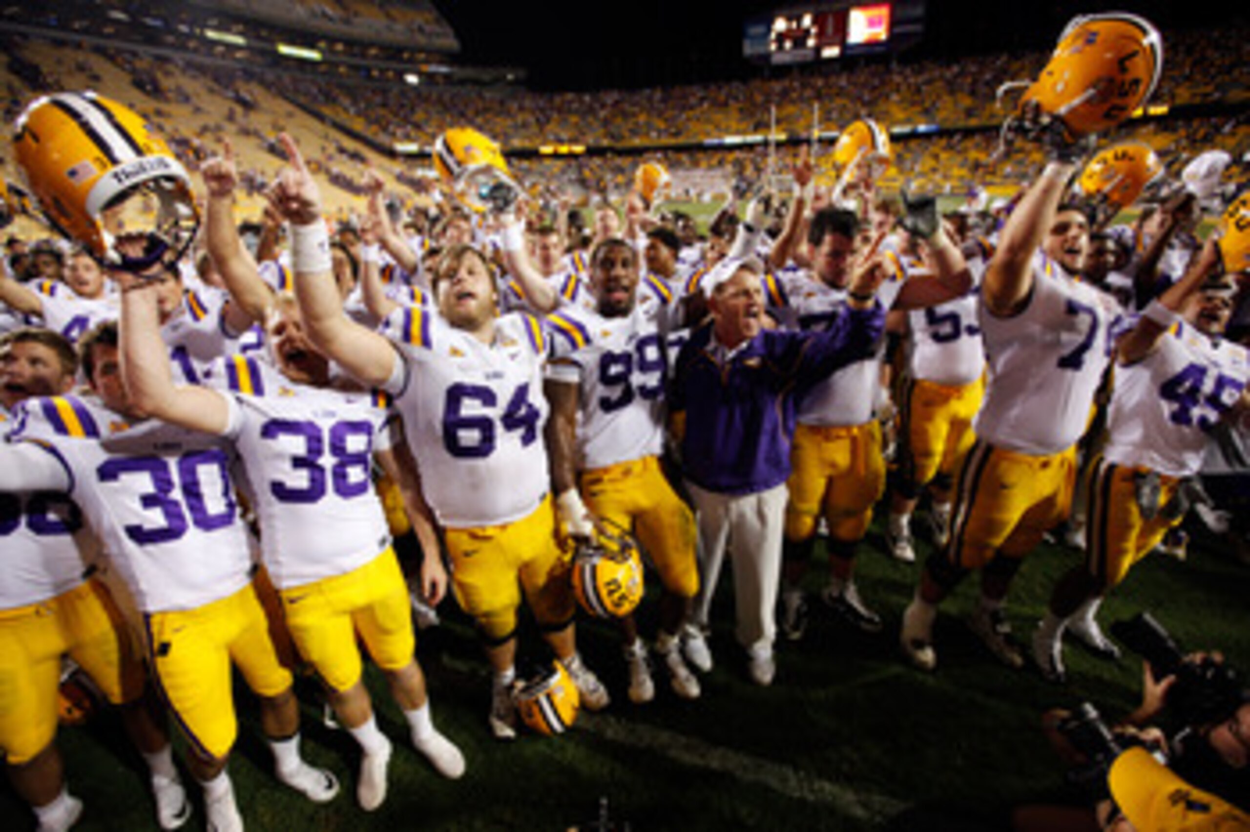 BATON ROUGE, LA - SEPTEMBER 25:  Members of the Louisiana State Univeristy Tigers celebrate after defeating the West Virginia Mountaineers 14-20 at Tiger Stadium on September 25, 2010 in Baton Rouge, Louisiana.  (Photo by Chris Graythen/Getty Images)