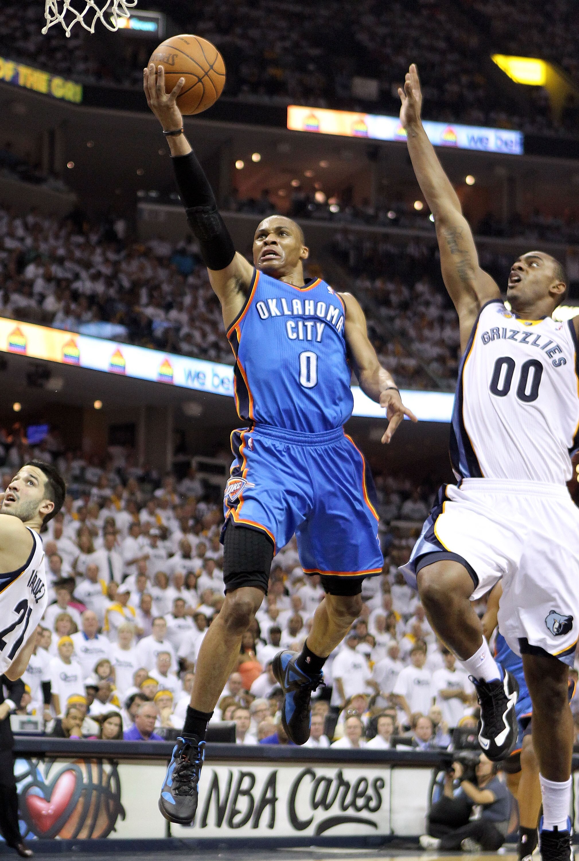MEMPHIS, TN - MAY 09:  Russell Westbrook #0 of the Oklahoma City Thunder shoots the ball while defended by Darrell Arthur #00 of the Memphis Grizzlies in Game Four of the Western Conference Semifinals in the 2011 NBA Playoffs at FedExForum on May 9, 2011 