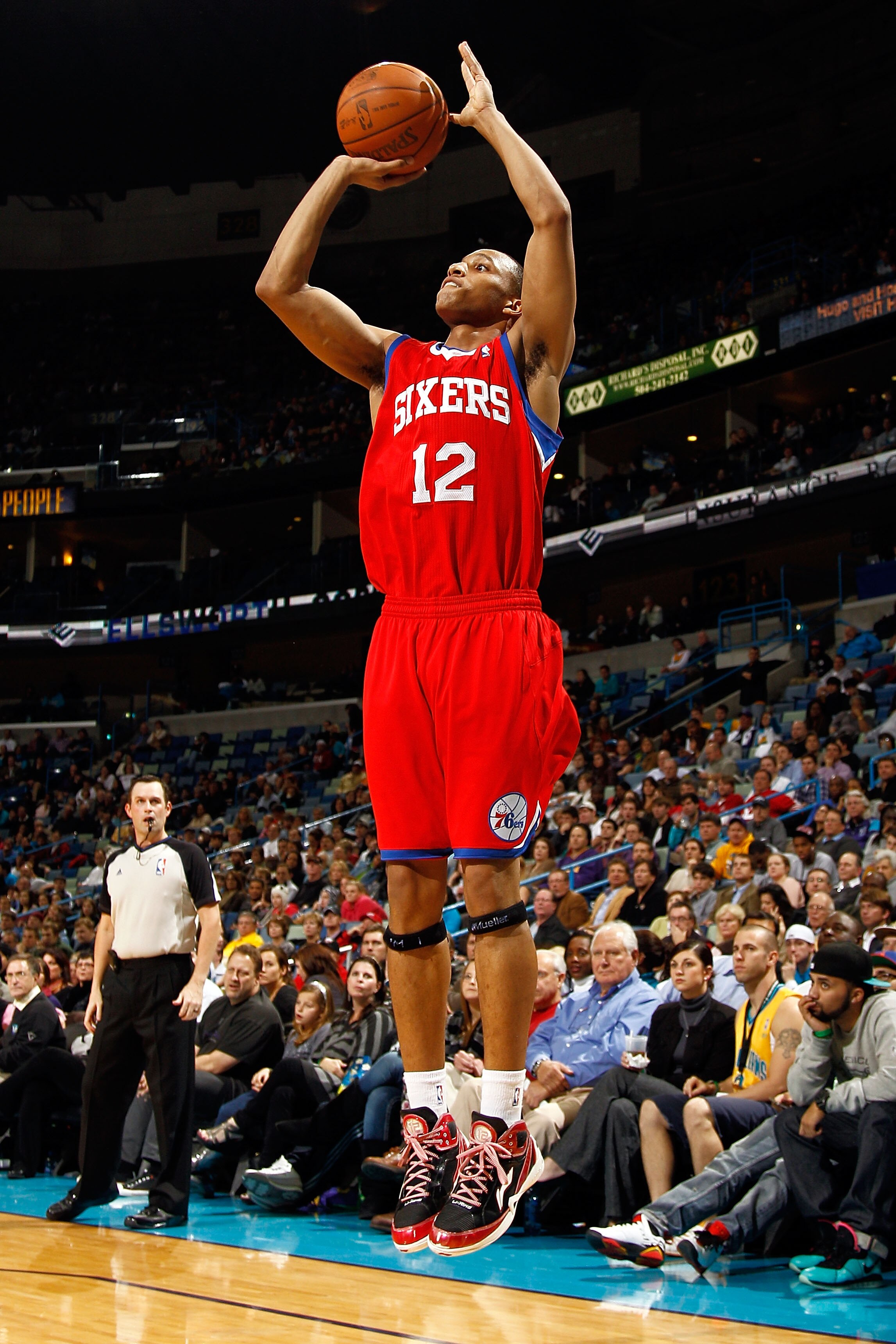 NEW ORLEANS, LA - JANUARY 03:  Evan Turner #12 of the Philadelphia 76ers shoots a jumper against the New Orleans Hornets at New Orleans Arena on January 3, 2011 in New Orleans, Louisiana. NOTE TO USER: User expressly acknowledges and agrees that, by downl