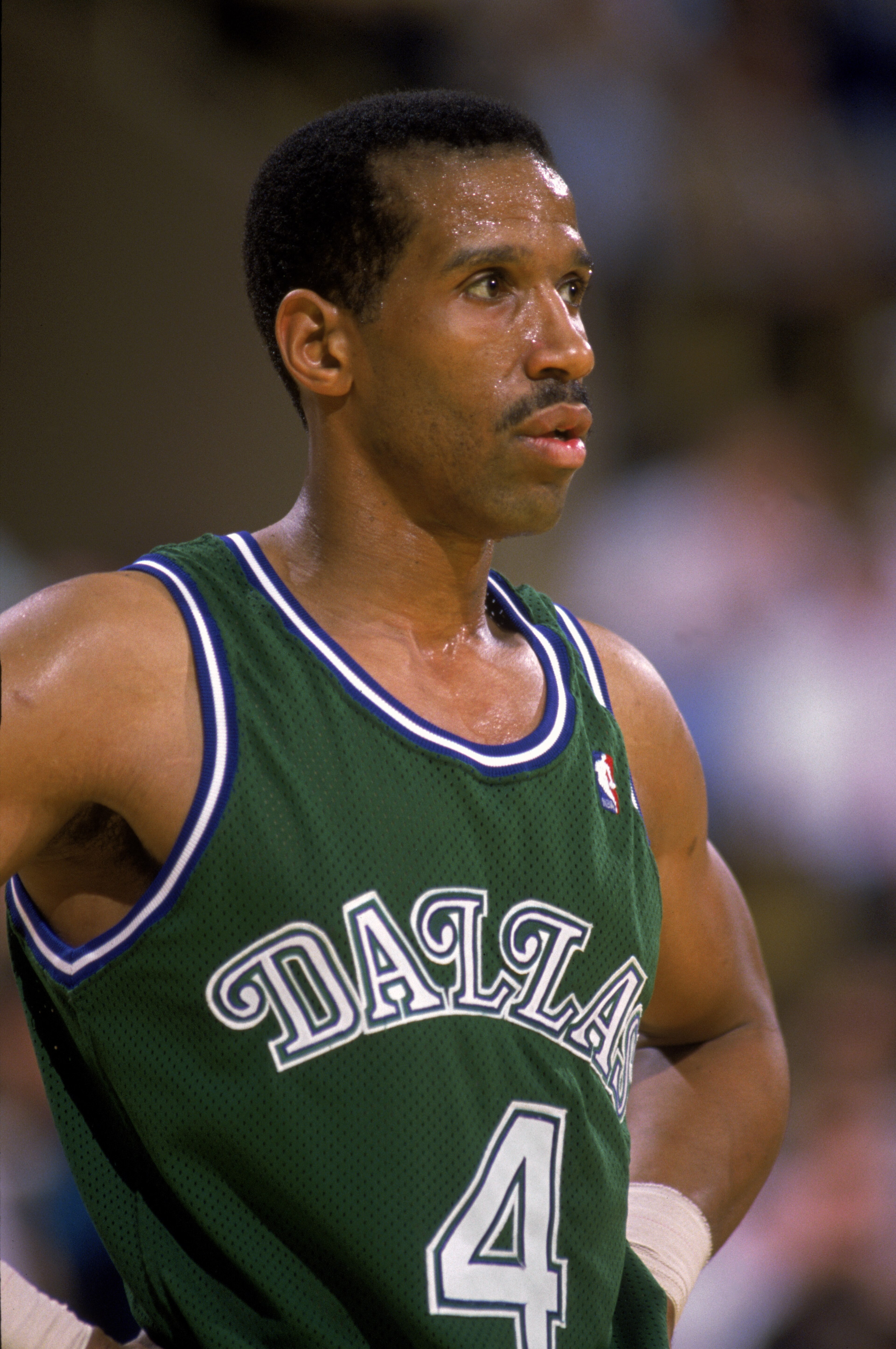 LOS ANGELES - 1989: Adrian Dantley #4 of the Dallas Mavericks stands on the court during the NBA game against the Los Angeles Lakers at the Great Western Forum in Los Angeles, California in 1989. (Photo by Stephen Dunn/Getty Images) LOS ANGELES - 1989: Adrian Dantley #4 of the Dallas Mavericks stands on the court during the NBA game against the Los Angeles Lakers at the Great Western Forum in Los Angeles, California in 1989. (Photo by Stephen Dunn/Getty Images)
