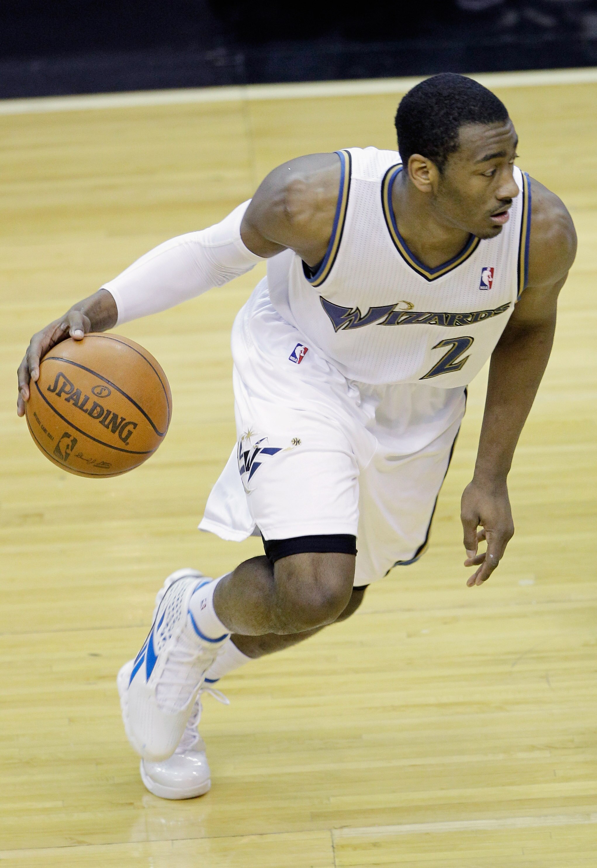 WASHINGTON, DC - MARCH 14: John Wall #2 of the Washington Wizards dribbles against the Oklahoma City Thunder during the second half at the Verizon Center on March 14, 2011 in Washington, DC. NOTE TO USER: User expressly acknowledges and agrees that, by do