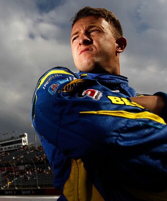 DARLINGTON, SC - MAY 06:  A.J. Allmendinger, driver of the #43 Best Buy Ford, stands on the grid during qualifying for the NASCAR Sprint Cup Series SHOWTIME Southern 500 at Darlington Raceway on May 6, 2011 in Darlington, South Carolina.  (Photo by Tom Pe
