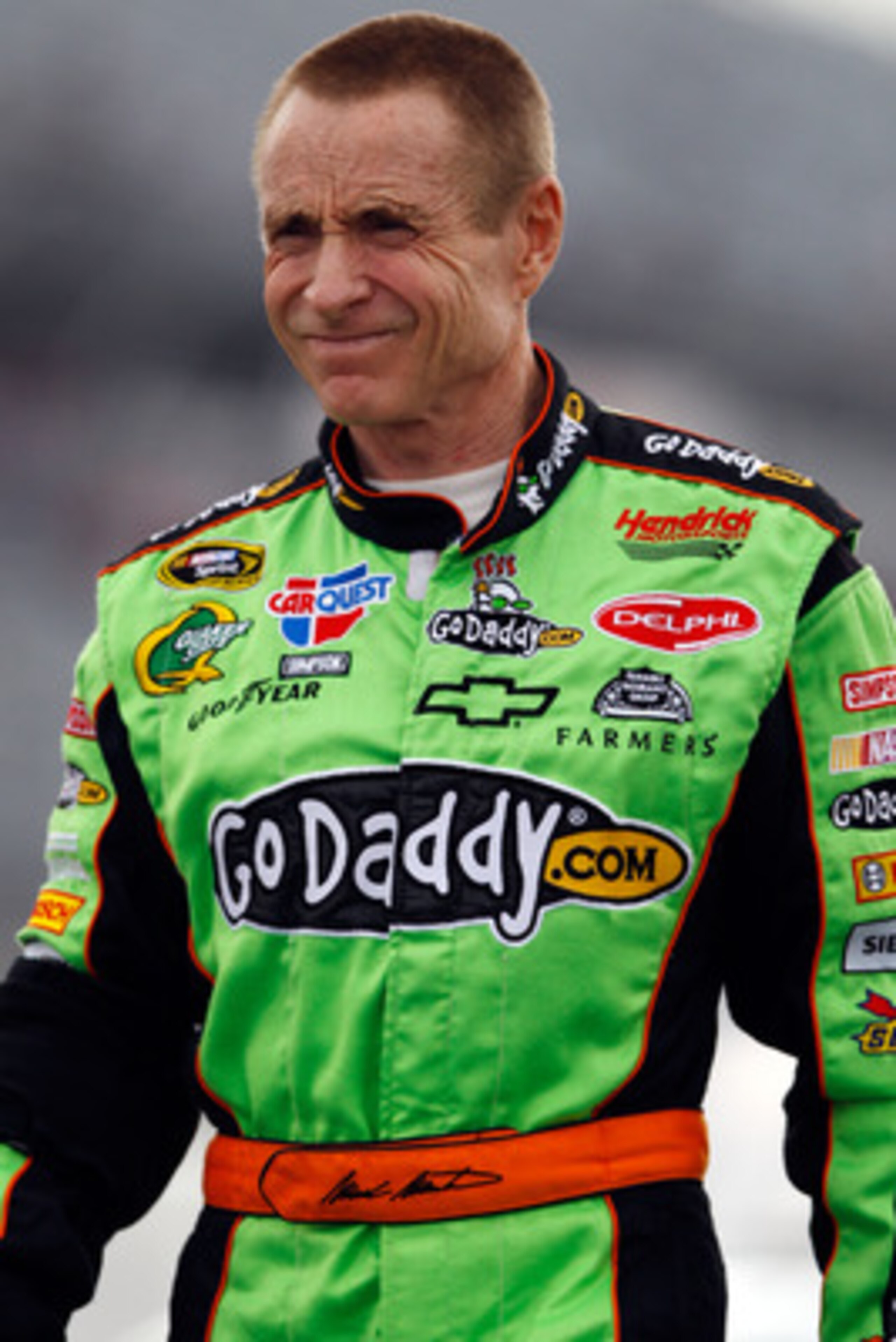 DARLINGTON, SC - MAY 06:  Mark Martin, driver of the #5 Carquest/GoDaddy.com Chevrolet, stands on pit road during qualifying for the NASCAR Sprint Cup Series SHOWTIME Southern 500 at Darlington Raceway on May 6, 2011 in Darlington, South Carolina.  (Photo