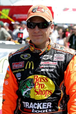 LOUDON, NH - JULY 17: Jamie McMurray, driver of the #1 Bass Pro Shops/Tracker Chevrolet, waits on the grid prior to the NASCAR Sprint Cup Series LENOX Industrial Tools 301 at New Hampshire Motor Speedway on July 17, 2011 in Loudon, New Hampshire.  (Photo