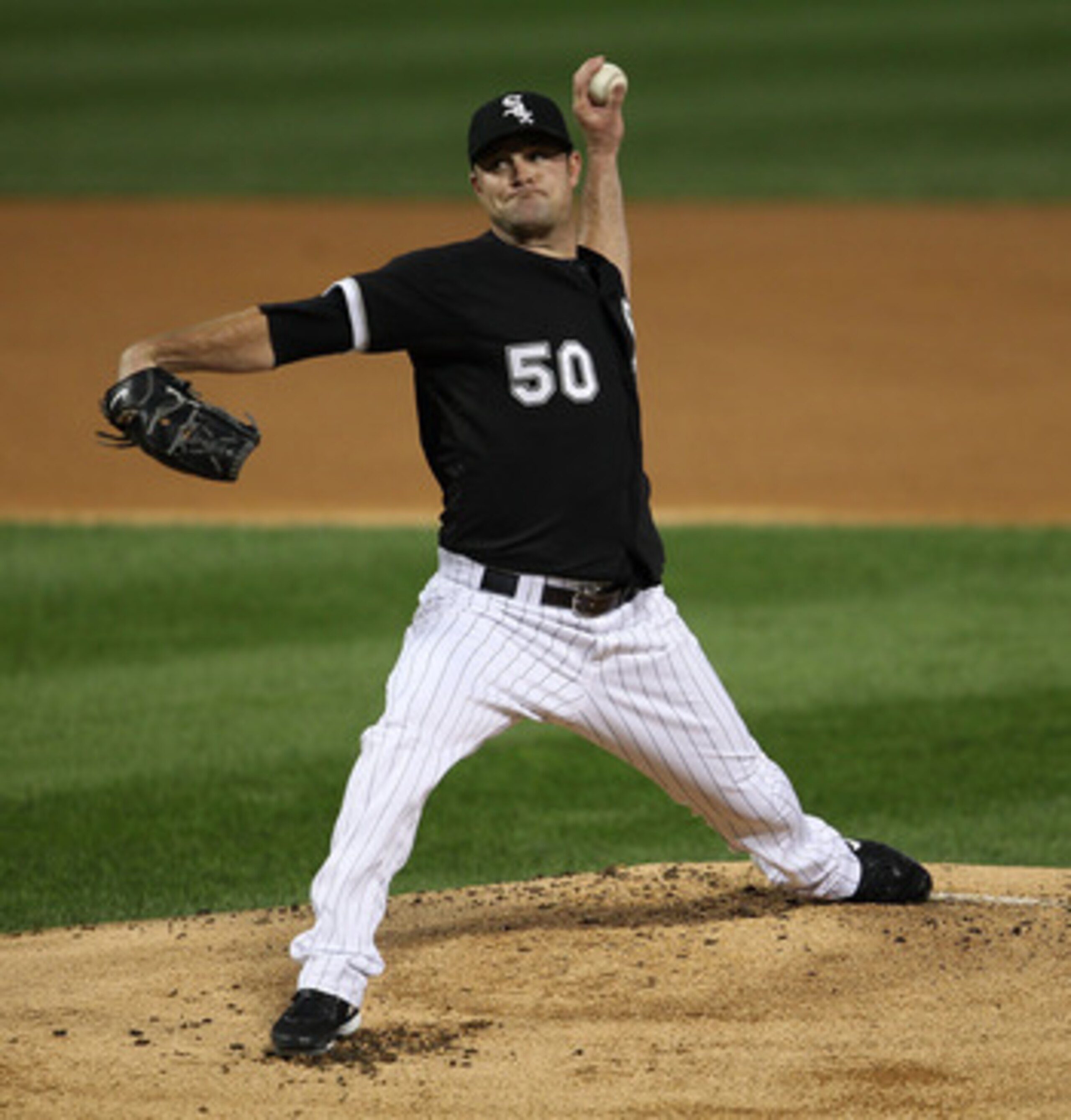 CHICAGO - SEPTEMBER 14: Starting pitcher John Danks #50 of the Chicago White Sox delivers the ball against of the Minnesota Twins at U.S. Cellular Field on September 14, 2010 in Chicago, Illinois. (Photo by Jonathan Daniel/Getty Images) CHICAGO - SEPTEMBER 14: Starting pitcher John Danks #50 of the Chicago White Sox delivers the ball against of the Minnesota Twins at U.S. Cellular Field on September 14, 2010 in Chicago, Illinois. (Photo by Jonathan Daniel/Getty Images)