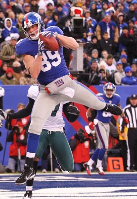 EAST RUTHERFORD, NJ - DECEMBER 19: Kevin Boss #89 of the New York Giants scores a touchdown against the Philadelphia Eagles during their game on December 19, 2010 at The New Meadowlands Stadium in East Rutherford, New Jersey. (Photo by Al Bello/Getty Im EAST RUTHERFORD, NJ - DECEMBER 19: Kevin Boss #89 of the New York Giants scores a touchdown against the Philadelphia Eagles during their game on December 19, 2010 at The New Meadowlands Stadium in East Rutherford, New Jersey. (Photo by Al Bello/Getty Im
