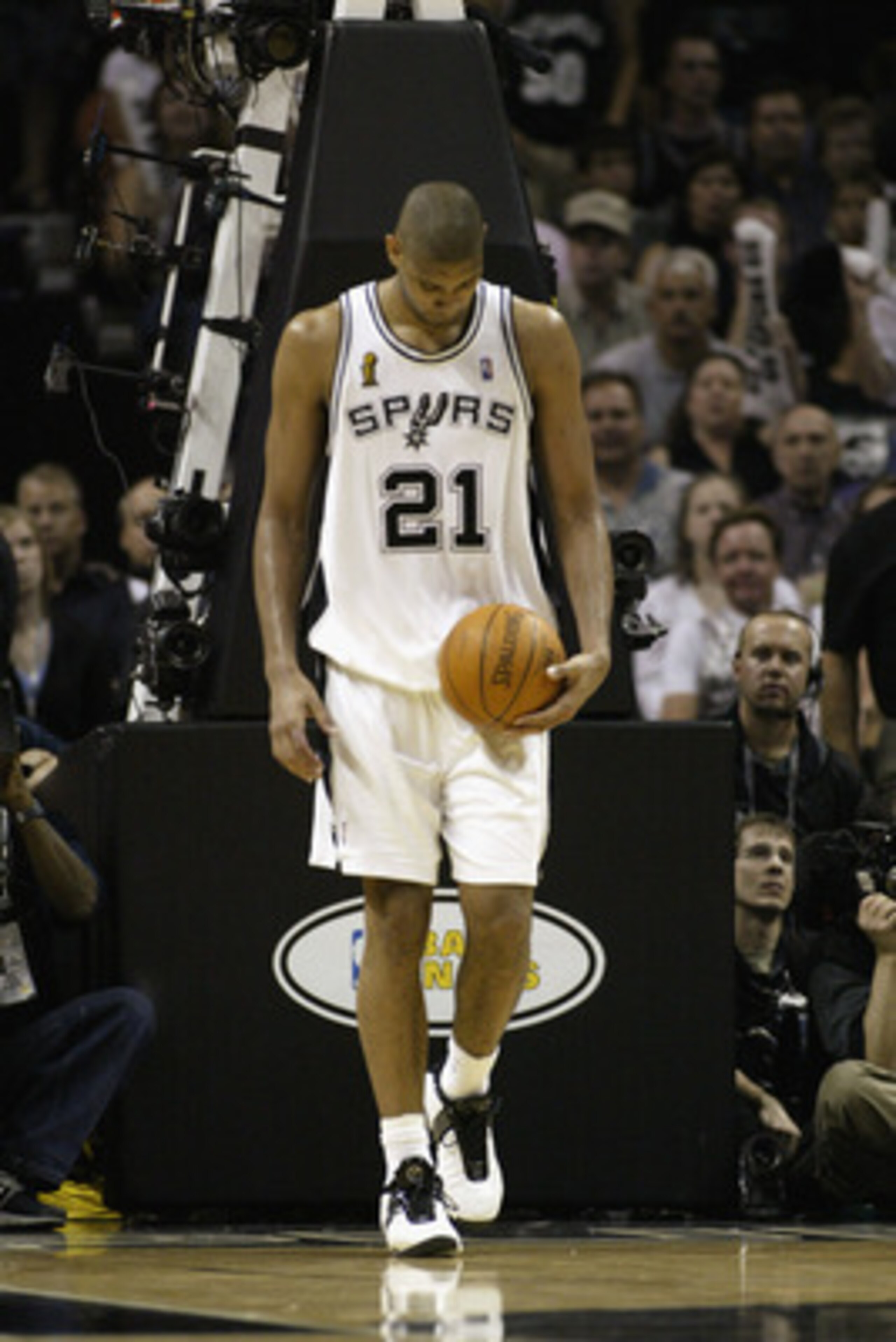 SAN ANTONIO - JUNE 6: Tim Duncan #21 of the San Antonio Spurs walks on the court dejected in Game two of the 2003 NBA Finals against the New Jersey Nets at SBC Center on June 6, 2003 in San Antonio, Texas. The Nets won 87-85. NOTE TO USER: User express SAN ANTONIO - JUNE 6: Tim Duncan #21 of the San Antonio Spurs walks on the court dejected in Game two of the 2003 NBA Finals against the New Jersey Nets at SBC Center on June 6, 2003 in San Antonio, Texas. The Nets won 87-85. NOTE TO USER: User express