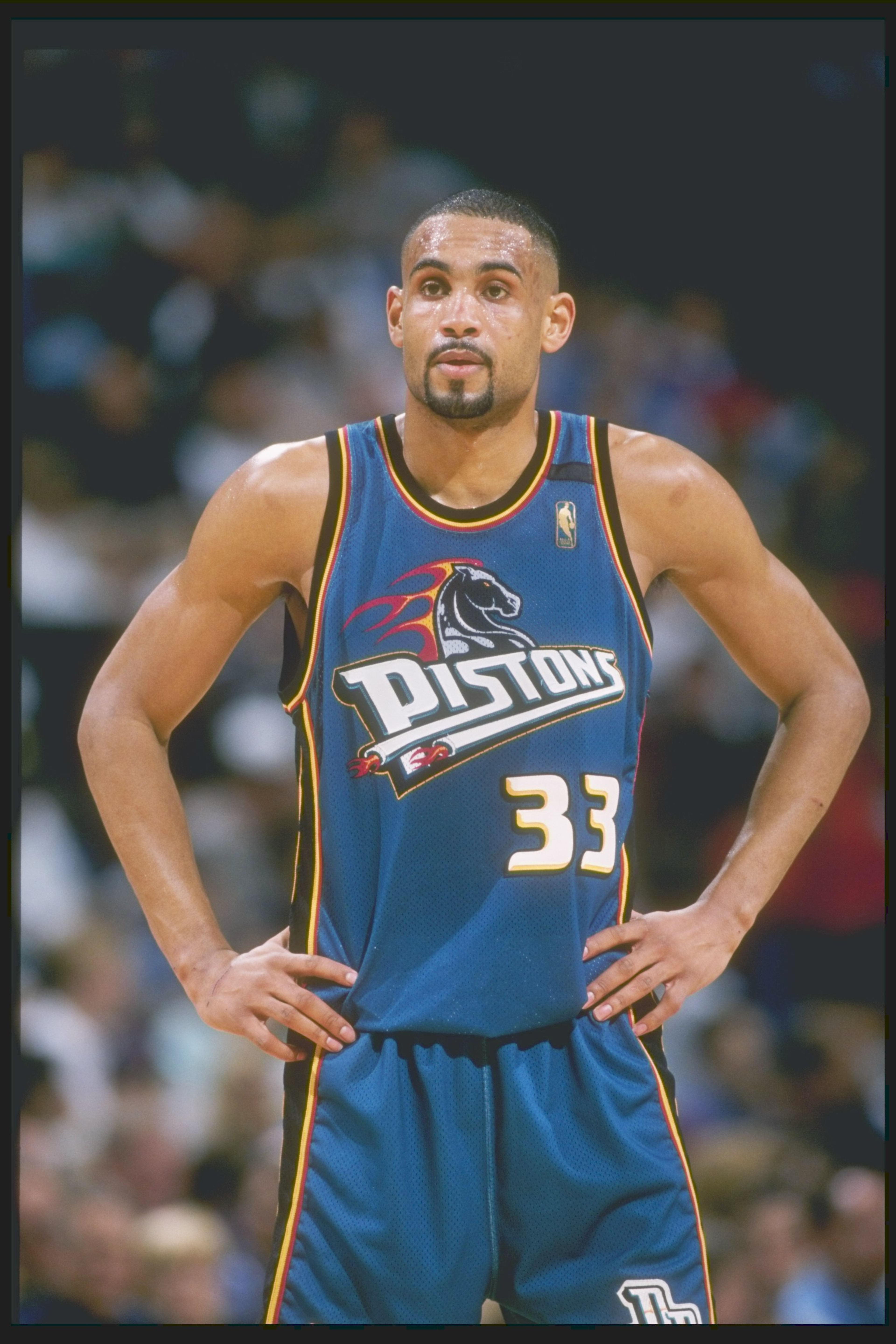 Forward Grant Hill of the Detroit Pistons stands on the court during a game against the Dallas Mavericks at Reunion Arena in Dallas, Texas. The Pistons won the game 100-82. Forward Grant Hill of the Detroit Pistons stands on the court during a game against the Dallas Mavericks at Reunion Arena in Dallas, Texas. The Pistons won the game 100-82.