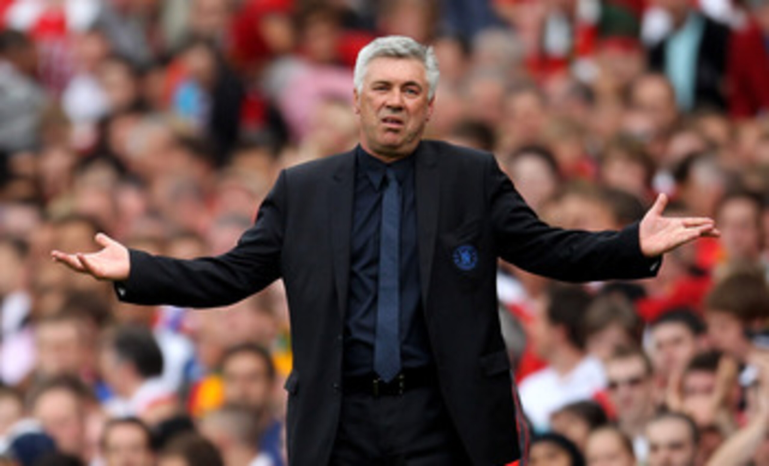 MANCHESTER, ENGLAND - MAY 08:  Chelsea Manager Carlo Ancelotti reacts during the Barclays Premier League match between Manchester United and Chelsea at Old Trafford on May 8, 2011 in Manchester, England.  (Photo by Alex Livesey/Getty Images)
