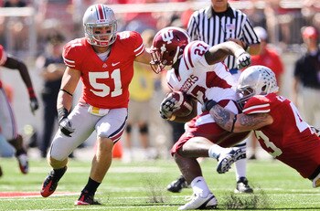 COLUMBUS, OH - OCTOBER 9:  Ross Homan #51 of the Ohio State Buckeyes moves in to assist on a tackle against the Indiana Hoosiers at Ohio Stadium on October 9, 2010 in Columbus, Ohio.  (Photo by Jamie Sabau/Getty Images)