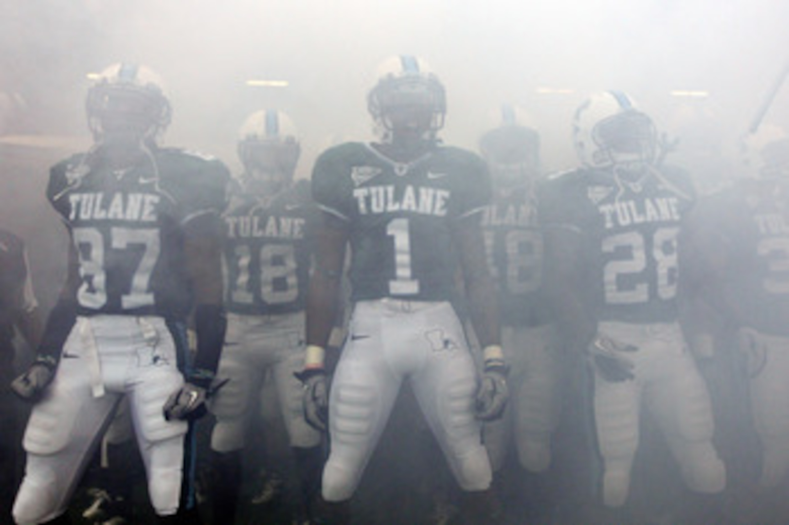 NEW ORLEANS - SEPTEMBER 11:  Members of the Tulane Green Wave take the field before playing the Ole Miss Rebels at the Louisiana Superdome on September 11, 2010 in New Orleans, Louisiana.  (Photo by Chris Graythen/Getty Images)