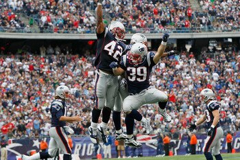 FOXBORO, MA - SEPTEMBER 26: BenJarvus Green-Elllis #42 of the New England Patriots celebrates his touchdown with teammates Sammy Morris #34 and Danny Woodhead #39 in the second half against the Buffalo Bills at Gillette Stadium in the second half on Septe