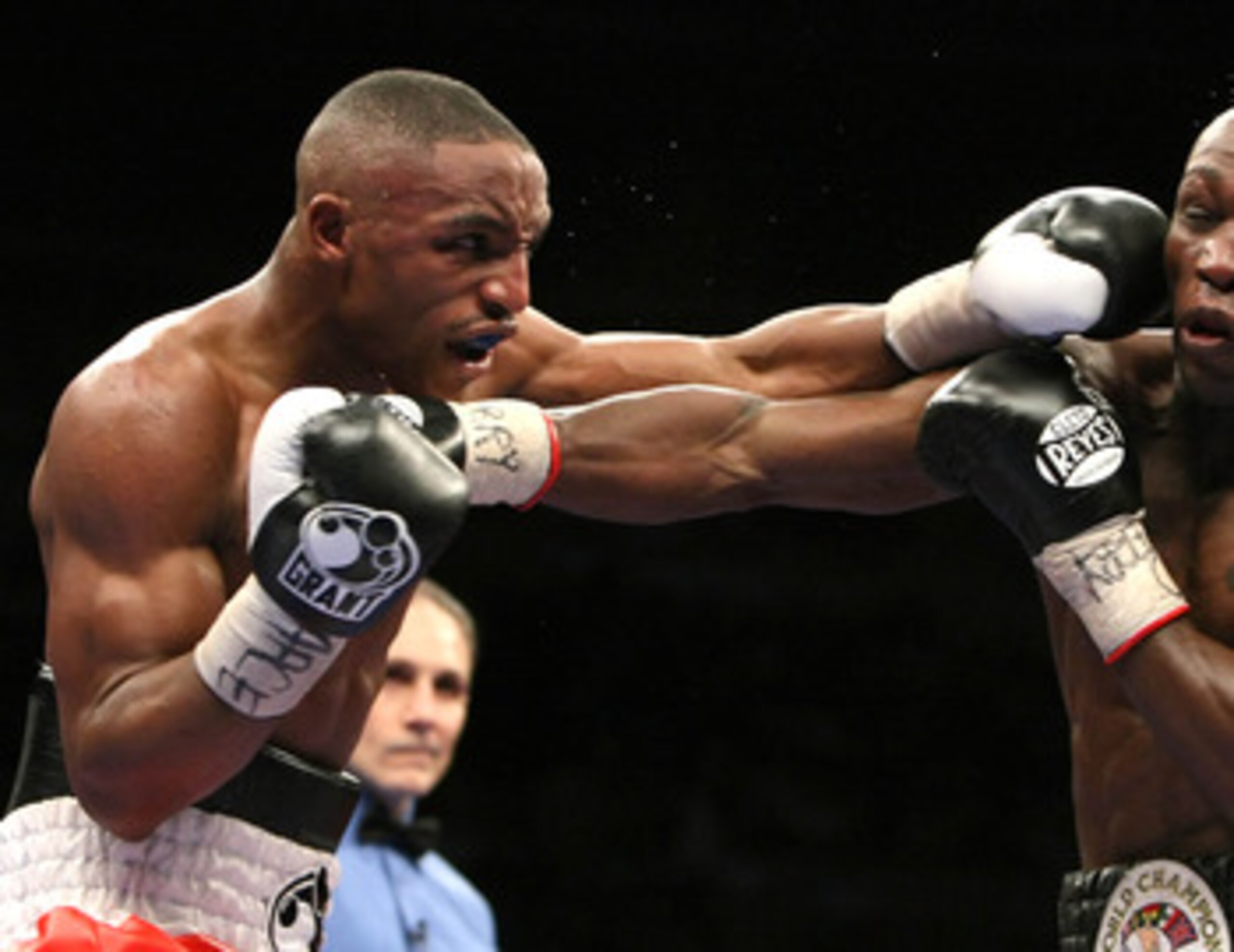 NEW YORK - JANUARY 19:  Devon Alexander (L) lands a left punch against DeMarcus Corley (R) during their WBC Continental Super Welterweight Championship bout at Madison Square Garden January 19, 2008 in New York City. Devon Alexander won the 10 round fight