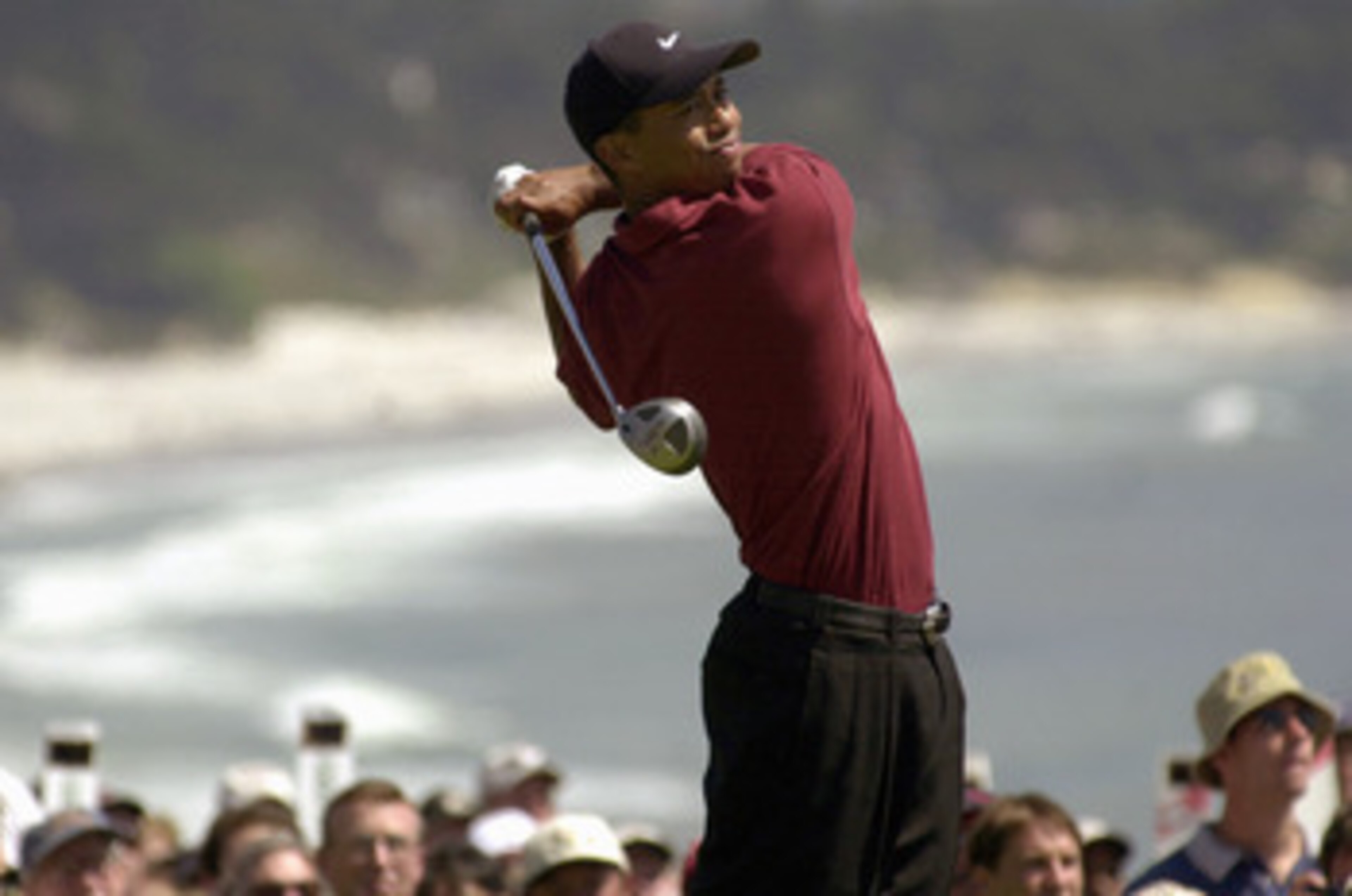 MONTEREY - JUNE 18 : Tiger Woods tees off on the 14th hole during the final round of the 100th US Open on June 18,2000 in Pebble Beach, California. (Photo by: Matthew Stockman/Getty Images)