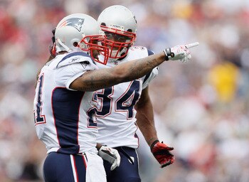 FOXBORO, MA - SEPTEMBER 12:  Fred Taylor #21 of the New England Patriots celebrates his run with teammate Sammy Morris #34 in the first half against the Cincinnati Bengals during the NFL season opener on September 12, 2010 at Gillette Stadium in Foxboro, 
