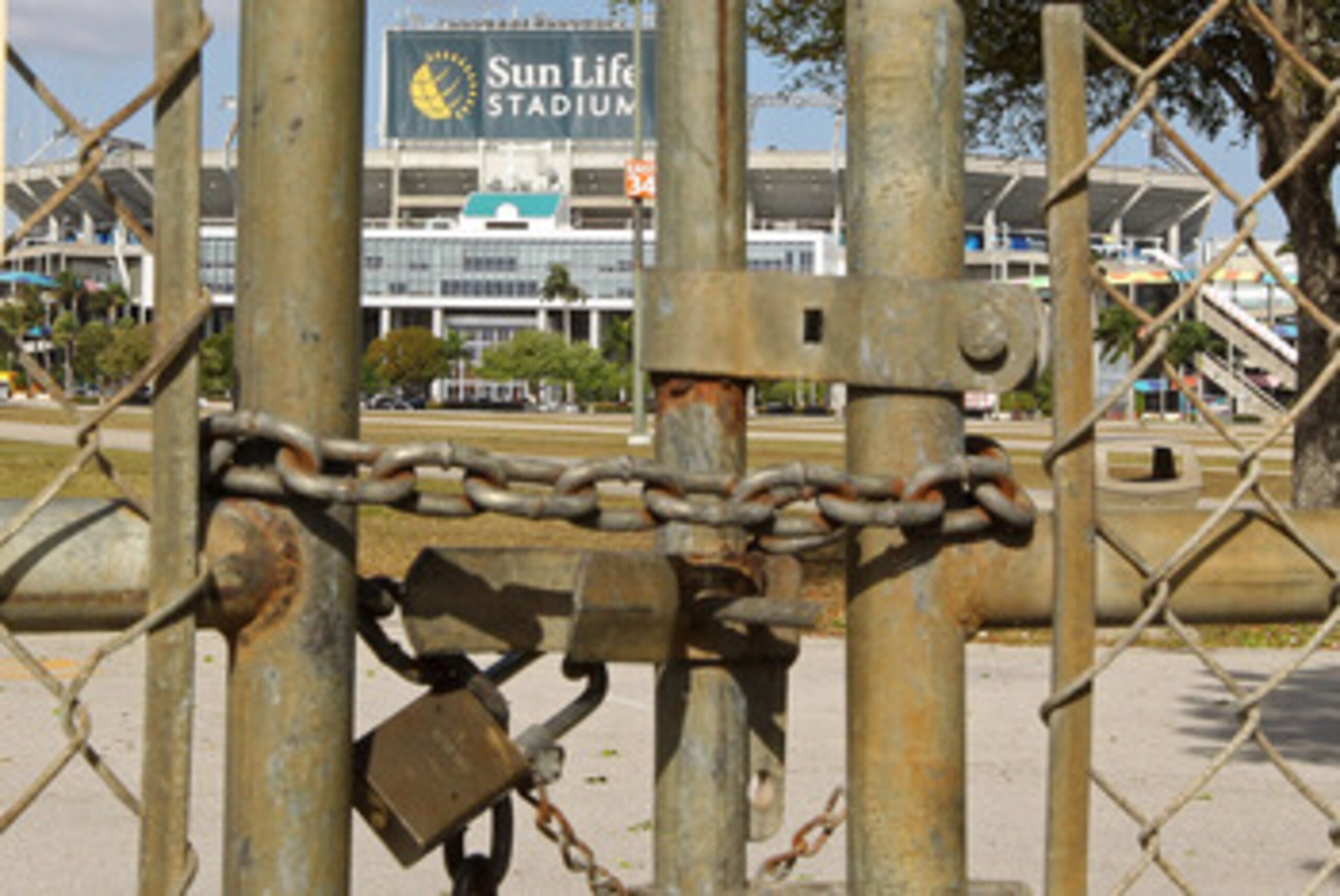 MIAMI GARDENS, FL - MARCH 03:  A view of Sun Life Stadium behind a locked gate as the NFL lockout looms on March 3, 2011 in Miami Gardens, Florida.  (Photo by Mike Ehrmann/Getty Images)