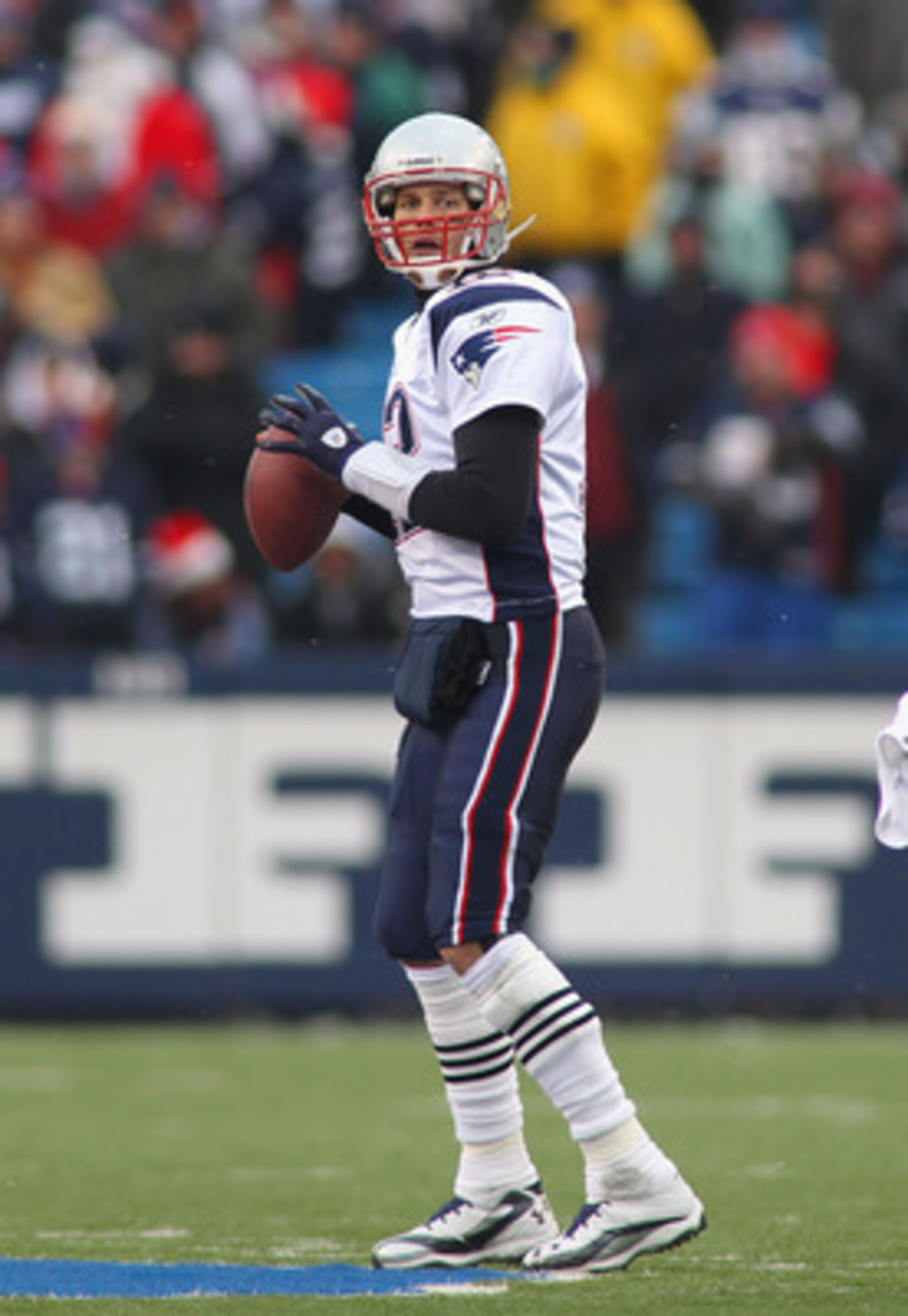 ORCHARD PARK, NY - DECEMBER 26: Tom Brady #12 of the New England Patriots readies to throw a pass against the Buffalo Bills at Ralph Wilson Stadium on December 26, 2010 in Orchard Park, New York. New England won 34-3. (Photo by Rick Stewart/Getty Imag ORCHARD PARK, NY - DECEMBER 26: Tom Brady #12 of the New England Patriots readies to throw a pass against the Buffalo Bills at Ralph Wilson Stadium on December 26, 2010 in Orchard Park, New York. New England won 34-3. (Photo by Rick Stewart/Getty Imag