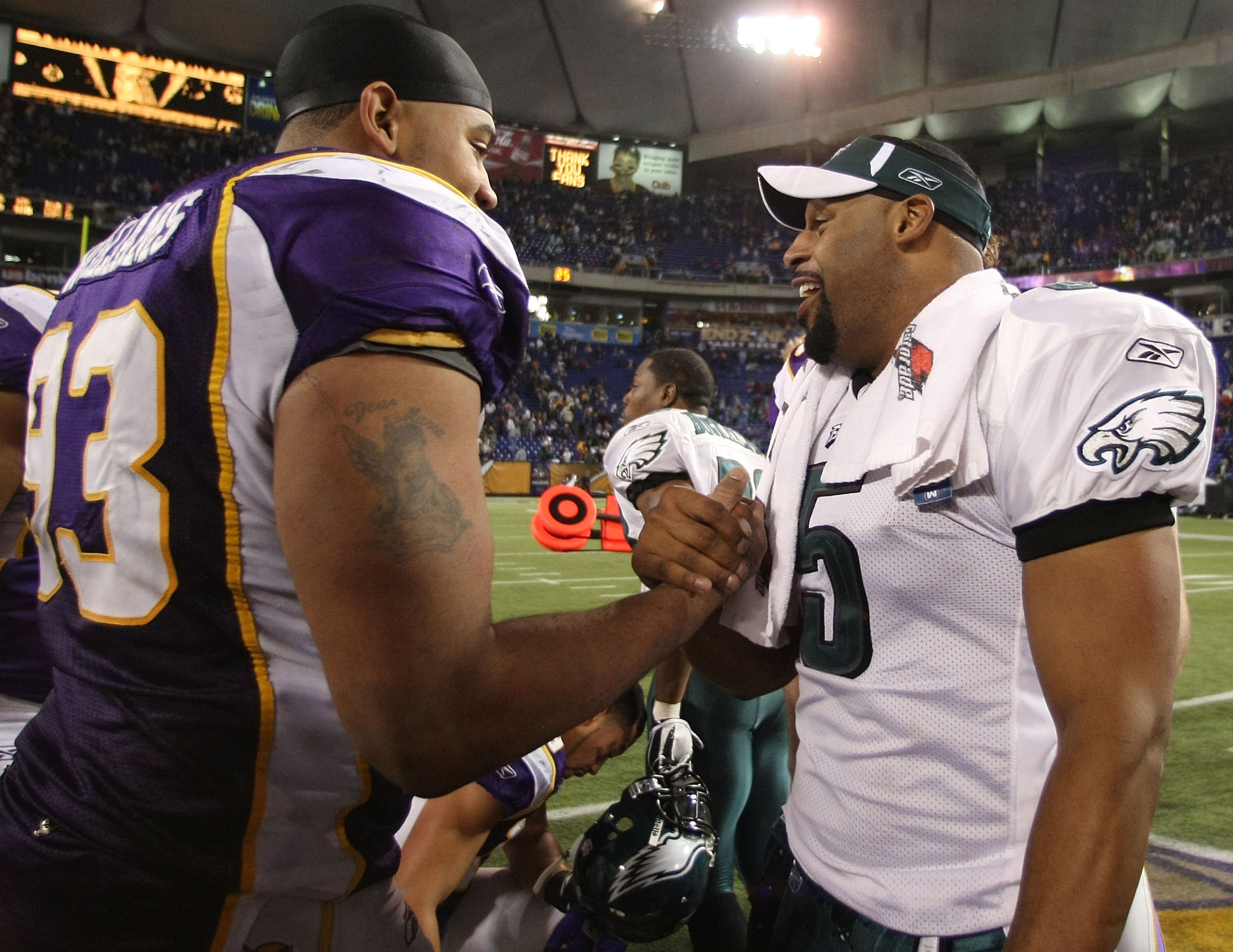 MINNEAPOLIS - JANUARY 04:   Kevin Williams #93 of the Minnesota Vikings congratulates Donovan McNabb #5 of the Philadelphia Eagles after the NFC Wild Card playoff game on January 4, 2009 at the Hubert H. Humphrey Metrodome in Minneapolis, Minnesota. The E