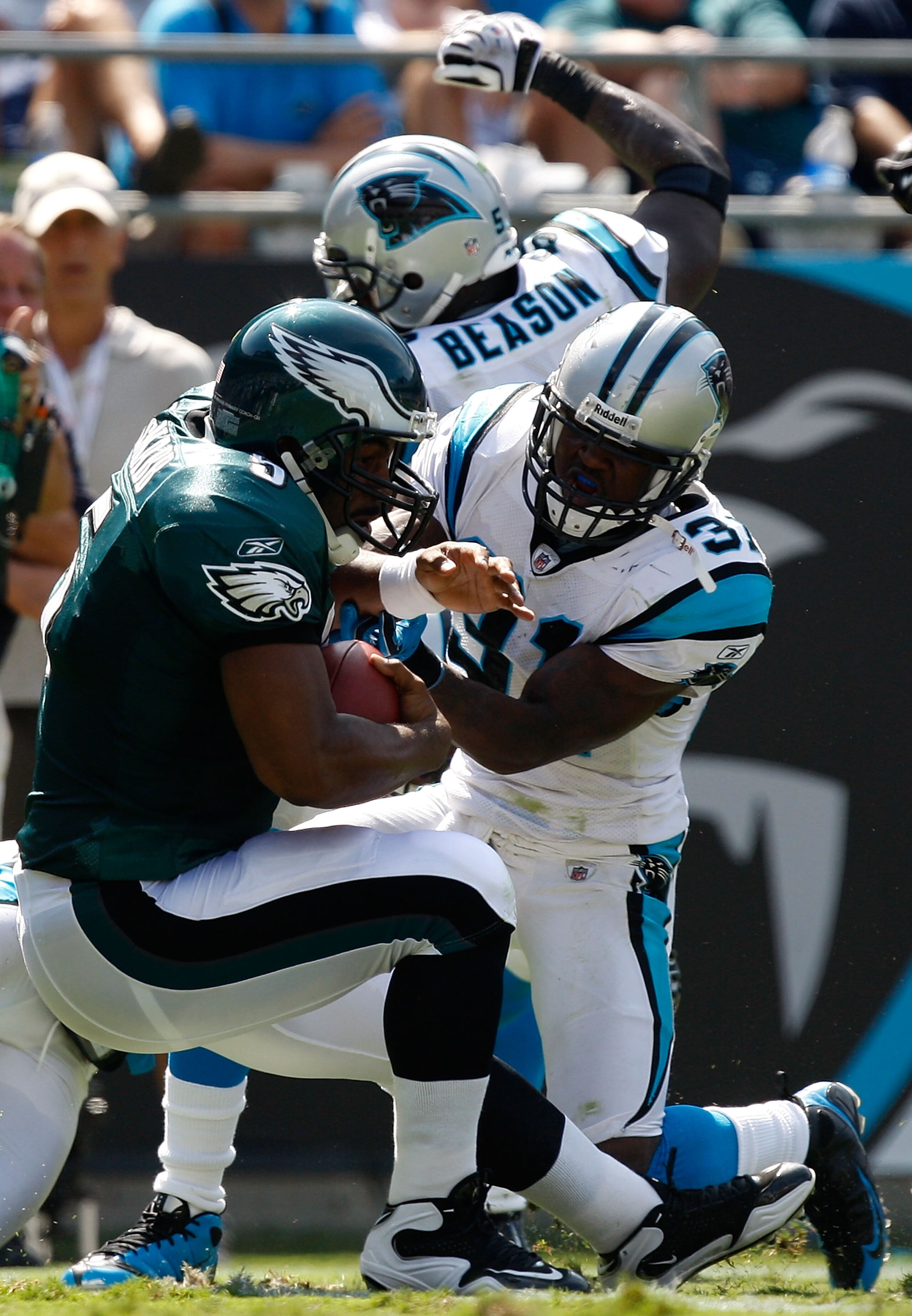 CHARLOTTE, NC - SEPTEMBER 13:  Quarterback Donovan McNabb #5 of the Philadelphia Eagles rushes for a touchdown in the second half of their NFL season opener against the Carolina Panthers at Bank of America Stadium on September 13, 2009 in Charlotte, North