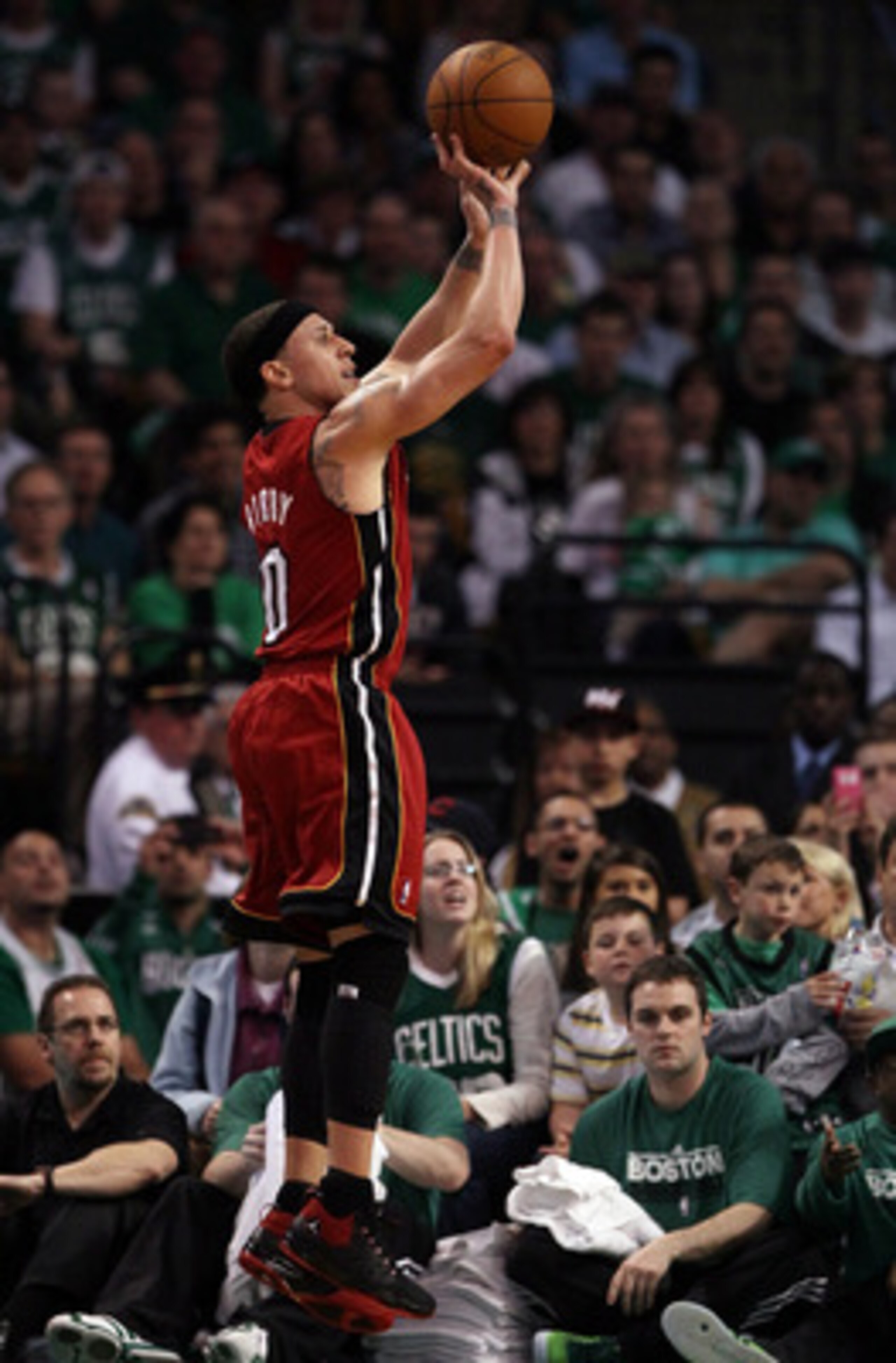 BOSTON, MA - MAY 07: Mike Bibby #0 of the Miami Heat takes a shot in the first quarter against the Boston Celtics in Game Three of the Eastern Conference Semifinals in the 2011 NBA Playoffs on May 7, 2011 at the TD Garden in Boston, Massachusetts.  NOTE T