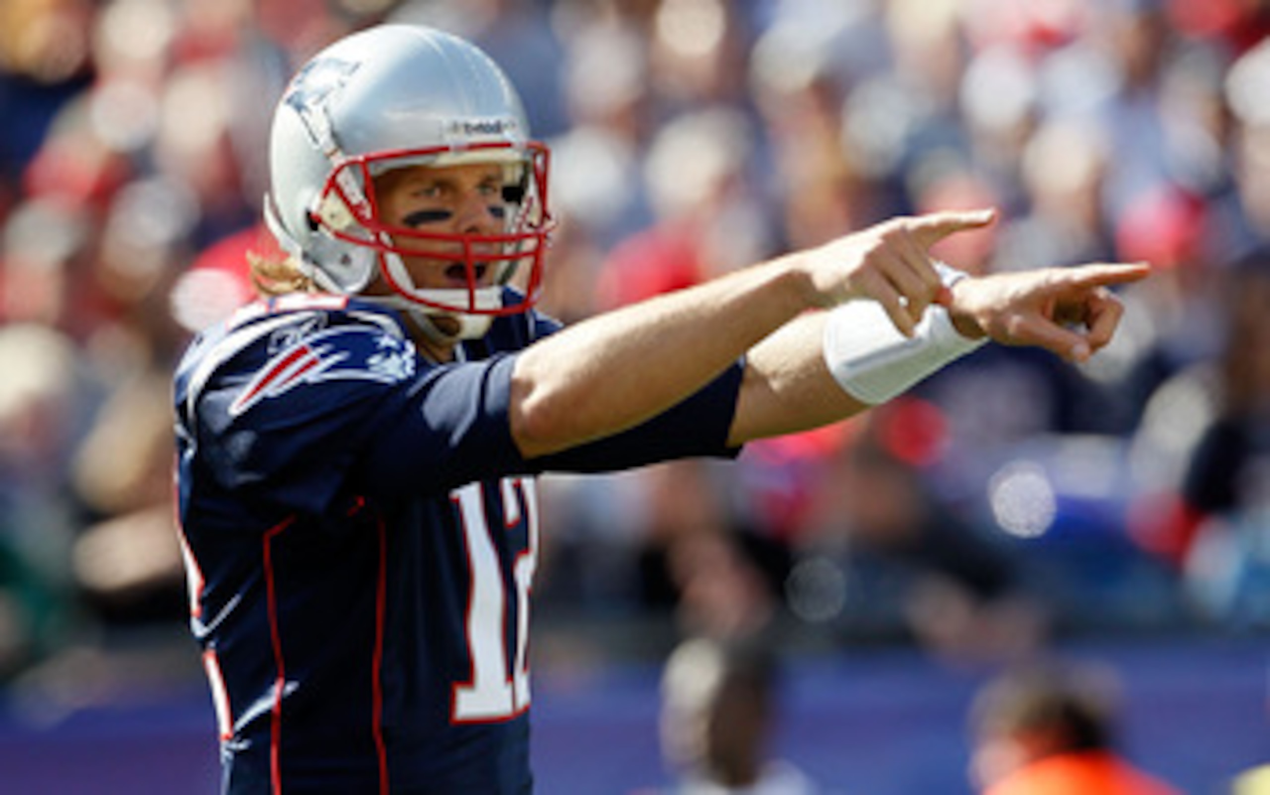 FOXBORO, MA - OCTOBER 17: Tom Brady #12 of the New England Patriots gestures during a game against the Baltimore Ravens at Gillette Stadium on October 17, 2010 in Foxboro, Massachusetts. (Photo by Jim Rogash/Getty Images) FOXBORO, MA - OCTOBER 17: Tom Brady #12 of the New England Patriots gestures during a game against the Baltimore Ravens at Gillette Stadium on October 17, 2010 in Foxboro, Massachusetts. (Photo by Jim Rogash/Getty Images)
