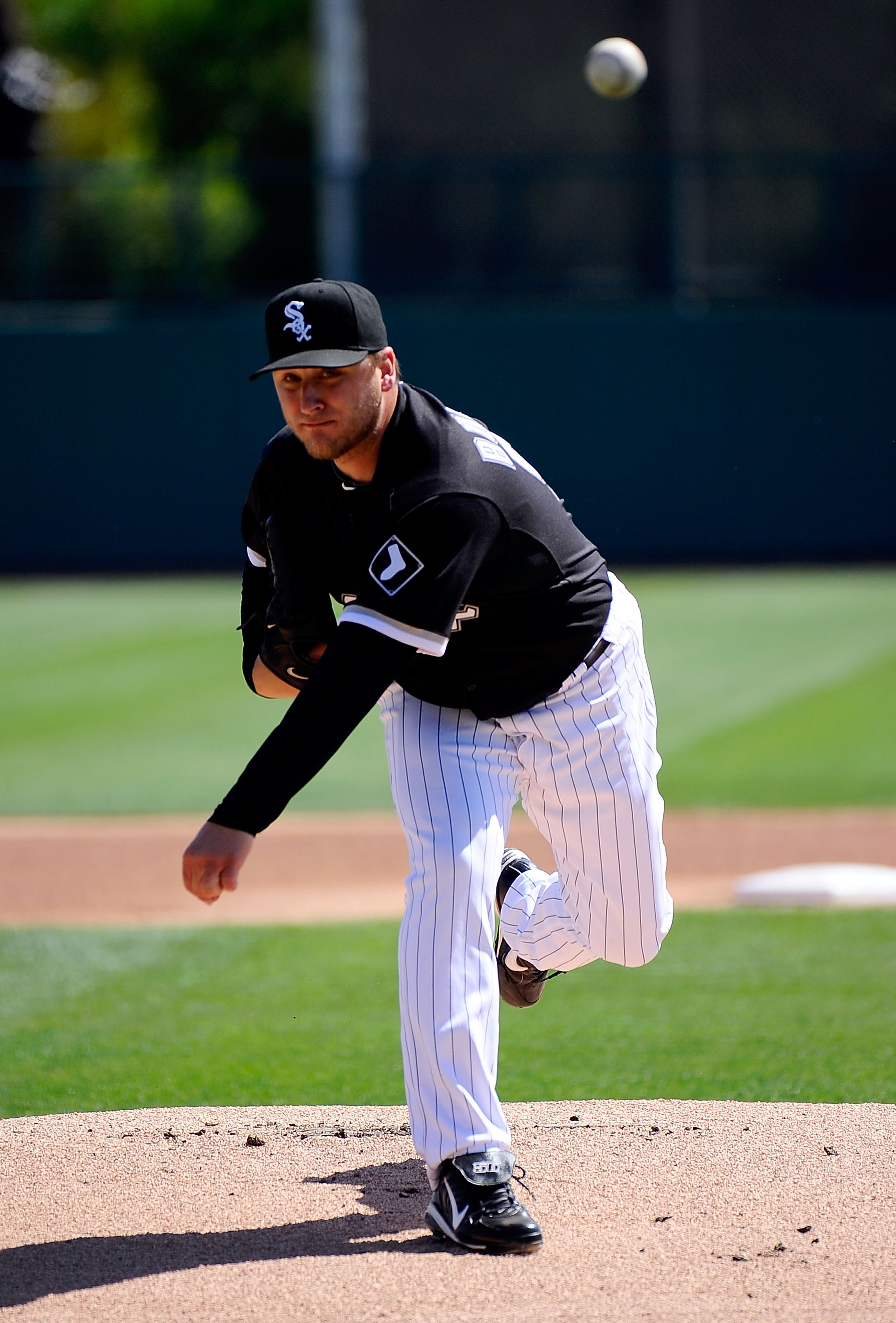 GLENDALE, AZ - MARCH 11:  Mark Buehrle #56 of the Chicago White Sox pitches during the spring training baseball game against Chicago Cubs at Camelback Ranch on March 11, 2011 in Glendale, Arizona.  (Photo by Kevork Djansezian/Getty Images)