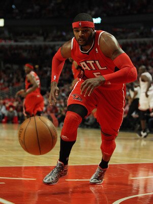 CHICAGO, IL - MAY 04: Josh Smith #5 of the Atlanta Hawks chases a loose ball against the Chicago Bulls in Game Two of the Eastern Conference Semifinals in the 2011 NBA Playoffs at the United Center on May 4, 2011 in Chicago, Illinois. NOTE TO USER: User e
