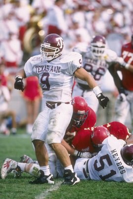 12 Oct 1996:  Linebacker Dat Nguyen of the Texas A&M Aggies celebrates during a game against the Iowa State Cyclones at Cyclone Stadium in Ames, Iowa.  Texas A&M won the game, 24-21. Mandatory Credit: Stephen Dunn  /Allsport