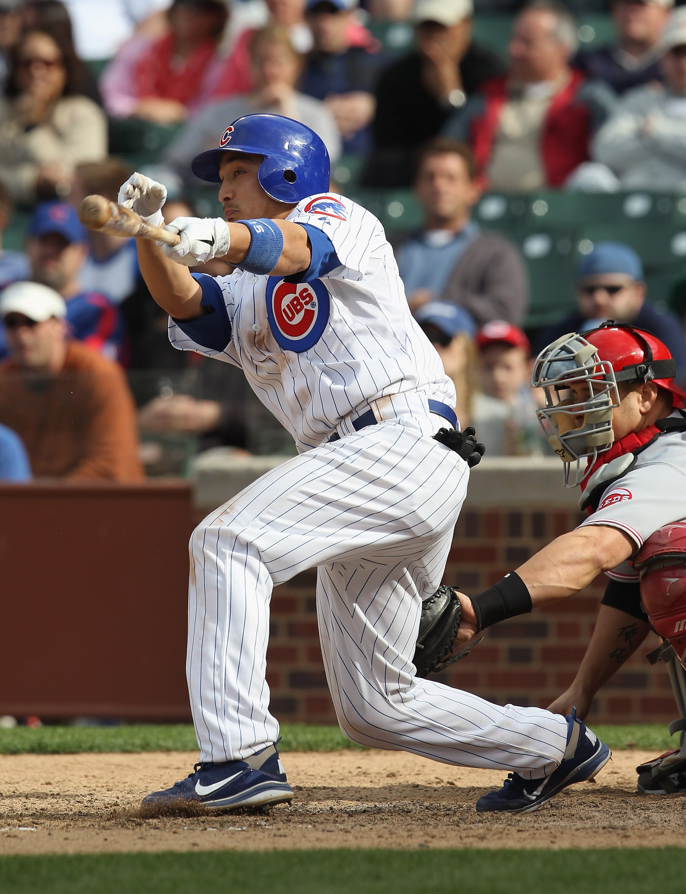 CHICAGO, IL - MAY 06: Darwin Barney #15 of the Chicago Cubs grounds into a 1-3 double play in the 9th inning against the Cincinnati Reds at Wrigley Field on May 6, 2011 in Chicago, Illinois. The Reds defeated the Cubs 5-4. (Photo by Jonathan Daniel/Getty