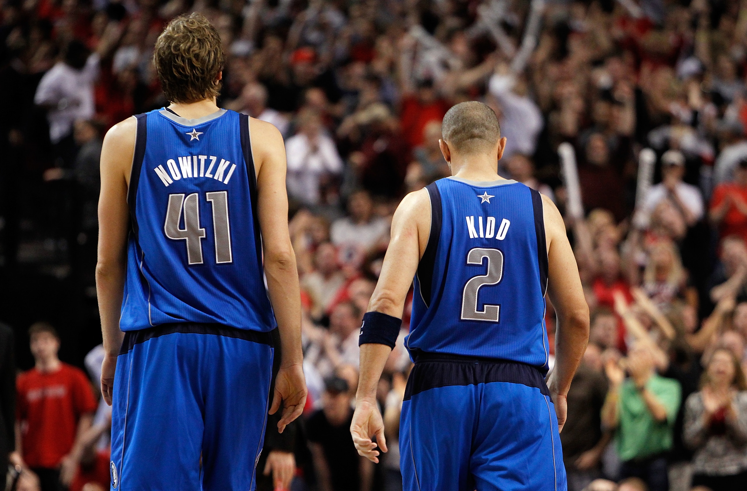PORTLAND, OR - APRIL 23:   Dirk Nowitzki #41 and Jason Kidd #2 of the Dallas Mavericks walks off the floor against the Portland Trail Blazers in Game Four of the Western Conference Quarterfinals in the 2011 NBA Playoffs on April 23, 2011 at the Rose Garde