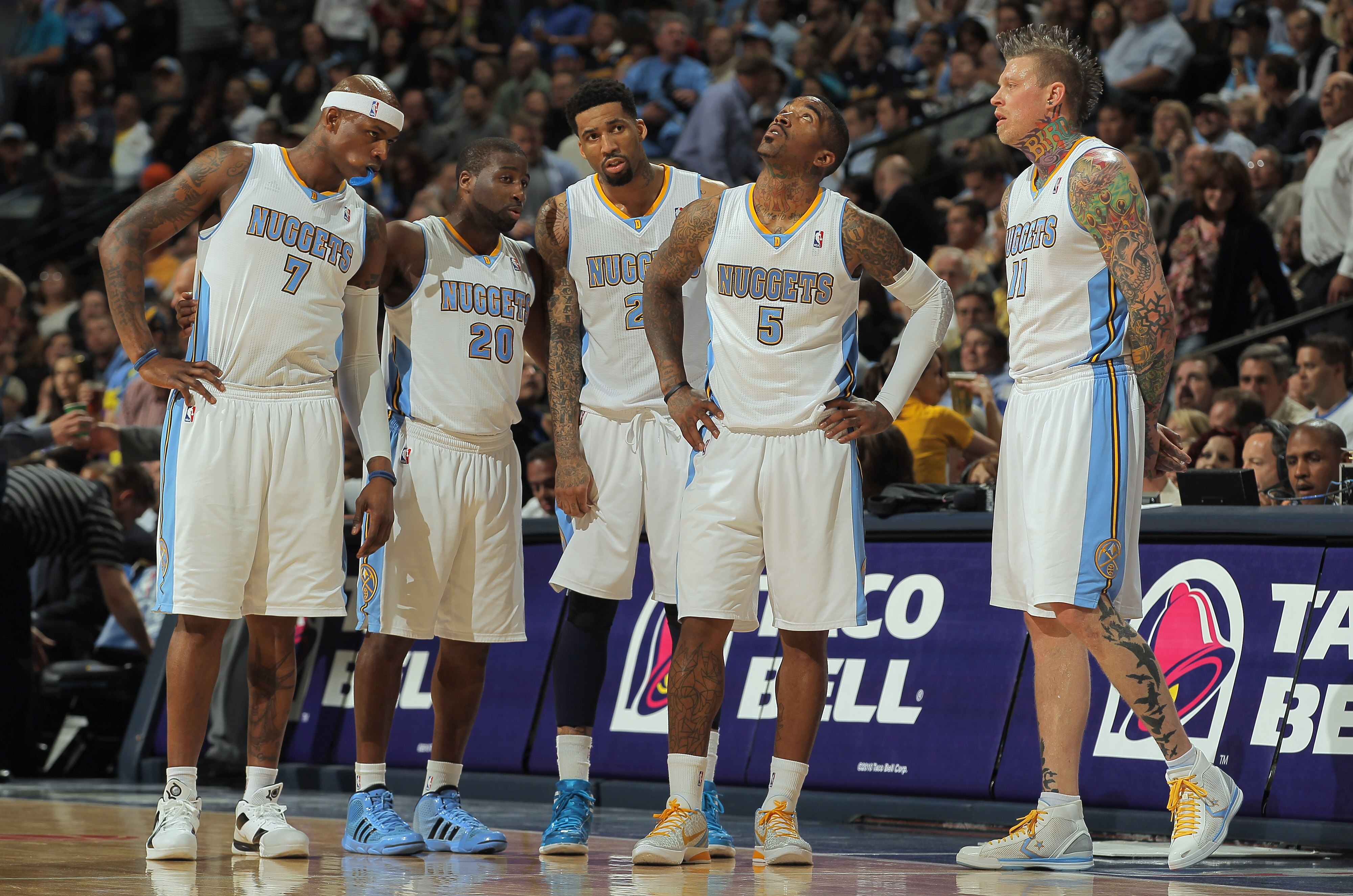 DENVER, CO - APRIL 25:  Al Harrington #7, Raymond Felton #20, Wilson Chandler, J.R. Smith #5 and Chris Andersen #11 of the Denver Nuggets look on as they face the Oklahoma City Thunder in Game Four of the Western Conference Quarterfinals in the 2011 NBA P