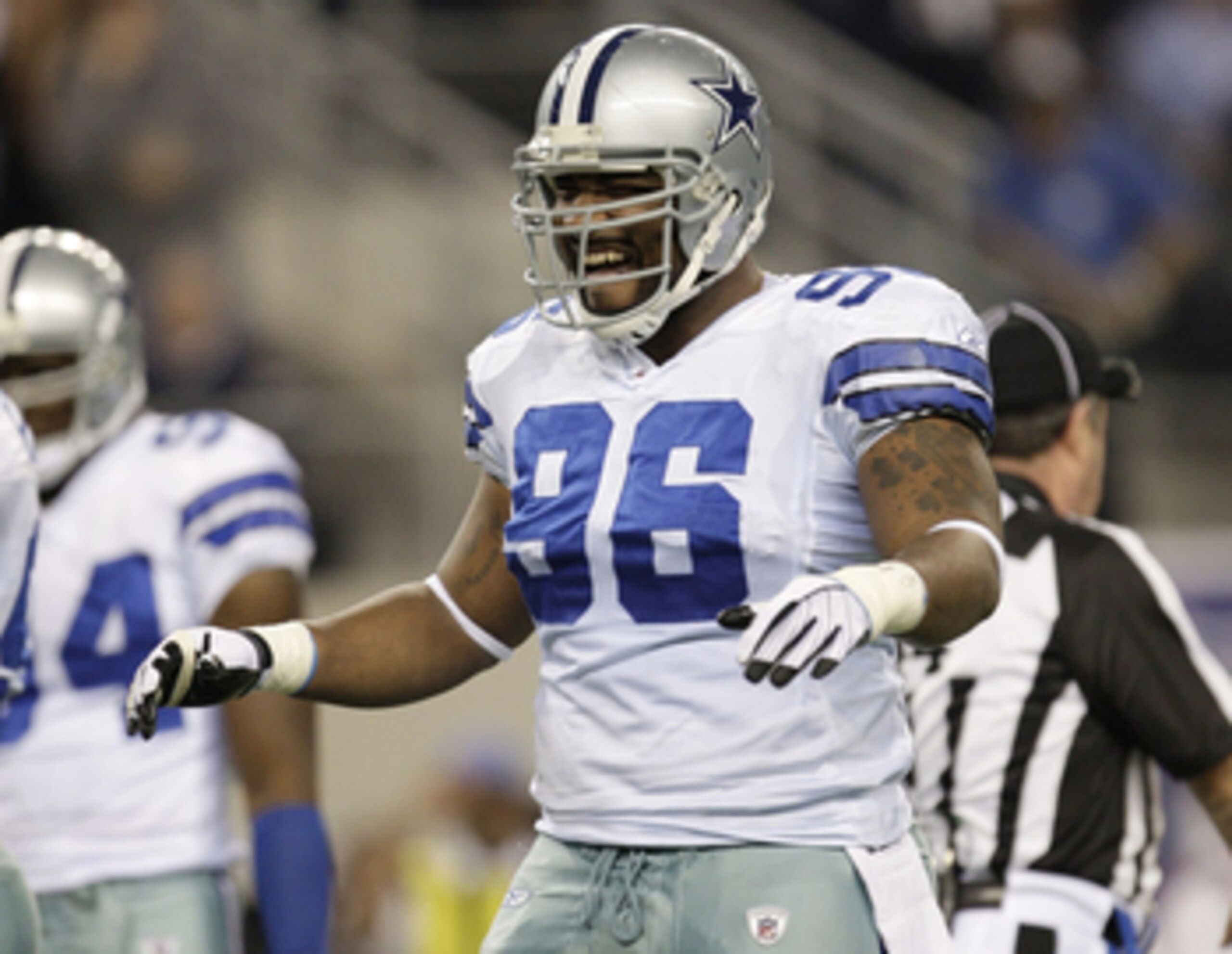 ARLINGTON, TX - JANUARY 9: Marcus Spears #96 of the Dallas Cowboys reacts in the first quarter against the Philadelphia Eagles during the 2010 NFC wild-card playoff game at Cowboys Stadium on January 9, 2010 in Arlington, Texas. (Photo by Jamie Squire/Ge ARLINGTON, TX - JANUARY 9: Marcus Spears #96 of the Dallas Cowboys reacts in the first quarter against the Philadelphia Eagles during the 2010 NFC wild-card playoff game at Cowboys Stadium on January 9, 2010 in Arlington, Texas. (Photo by Jamie Squire/Ge