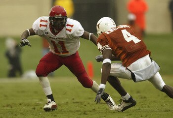 AUSTIN, TX - OCTOBER 26:  Defensive back Ellis Hobbs #11 of the Iowa State Cyclones eyes wide receiver Roy Williams #4 of the Texas Longhorns as he runs his route on October 26, 2002 at Texas Memorial Stadium in Austin, Texas.   Texas defeated Iowa State
