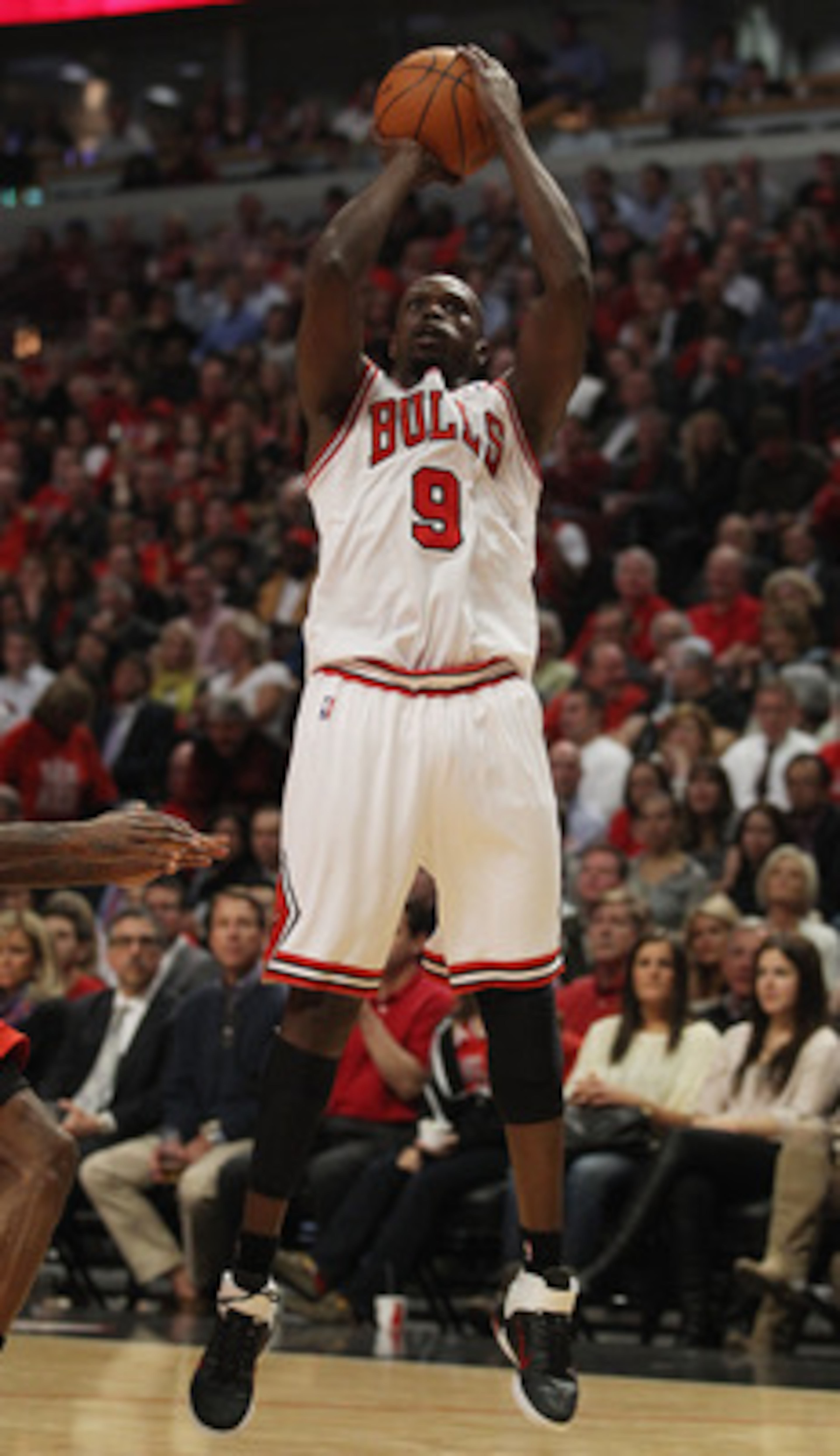 CHICAGO, IL - MAY 04: Loul Deng #9 of the Chicago Bulls goes up for a shot against the Atlanta Hawks in Game Two of the Eastern Conference Semifinals in the 2011 NBA Playoffs at the United Center on May 4, 2011 in Chicago, Illinois. The Bulls defeated the CHICAGO, IL - MAY 04: Loul Deng #9 of the Chicago Bulls goes up for a shot against the Atlanta Hawks in Game Two of the Eastern Conference Semifinals in the 2011 NBA Playoffs at the United Center on May 4, 2011 in Chicago, Illinois. The Bulls defeated the
