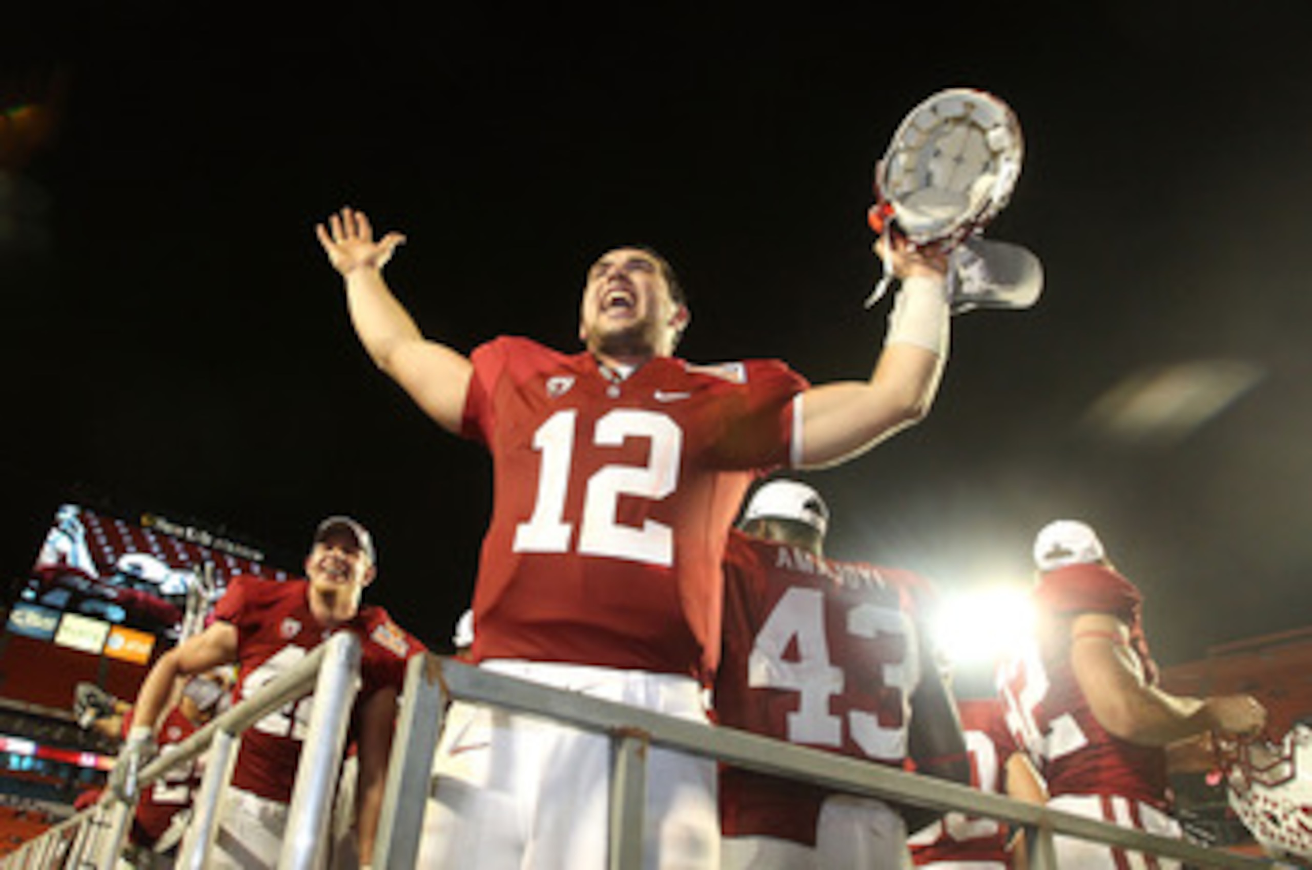 MIAMI, FL - JANUARY 03: Orange bowl MVP Andrew Luck of the Stanford Cardinal celebrates after Stanford won 40-12 against the Virginia Tech Hokies during the 2011 Discover Orange Bowl at Sun Life Stadium on January 3, 2011 in Miami, Florida. (Photo by Stre