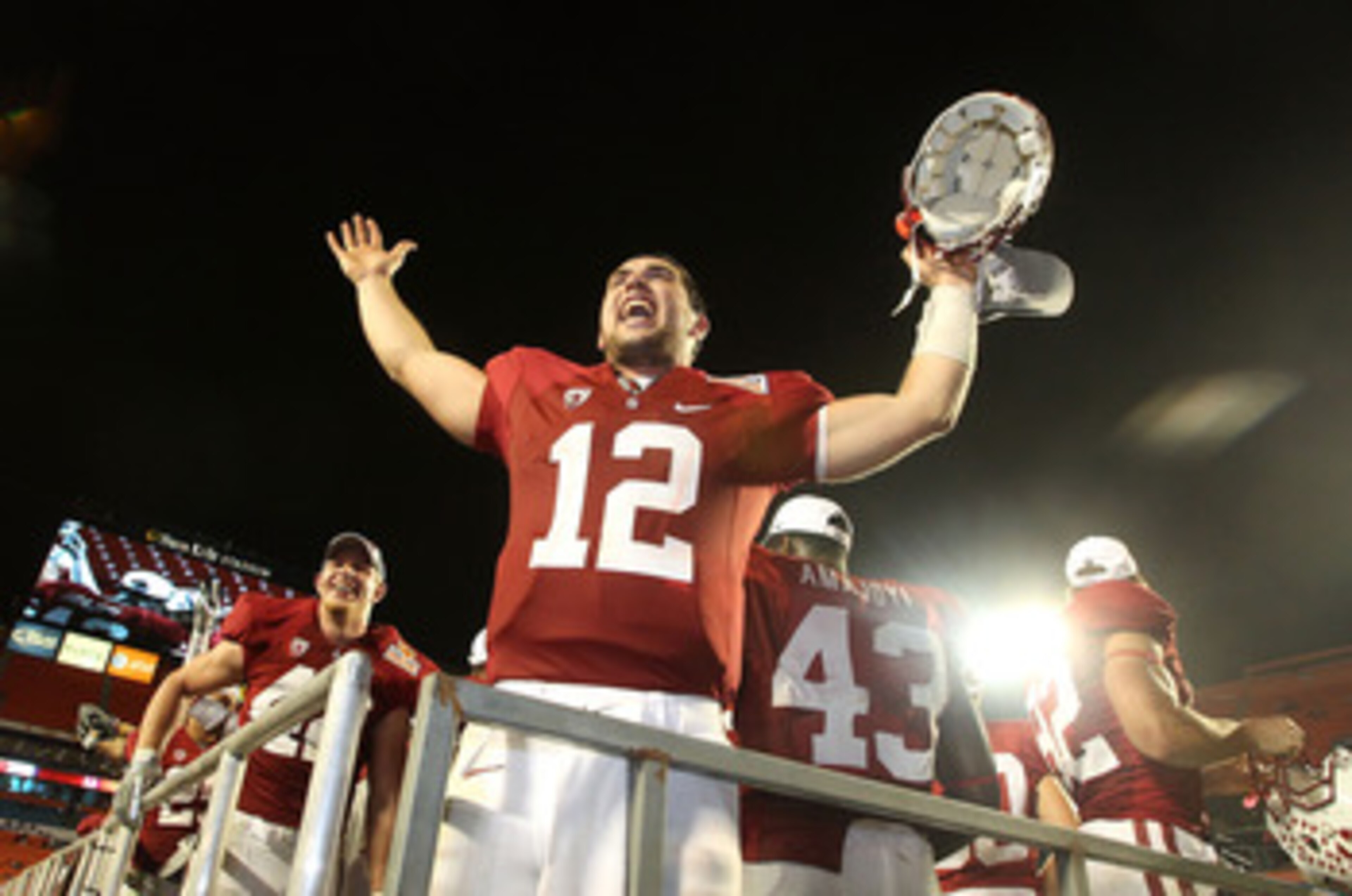 MIAMI, FL - JANUARY 03: Orange bowl MVP Andrew Luck of the Stanford Cardinal celebrates after Stanford won 40-12 against the Virginia Tech Hokies during the 2011 Discover Orange Bowl at Sun Life Stadium on January 3, 2011 in Miami, Florida. (Photo by Stre